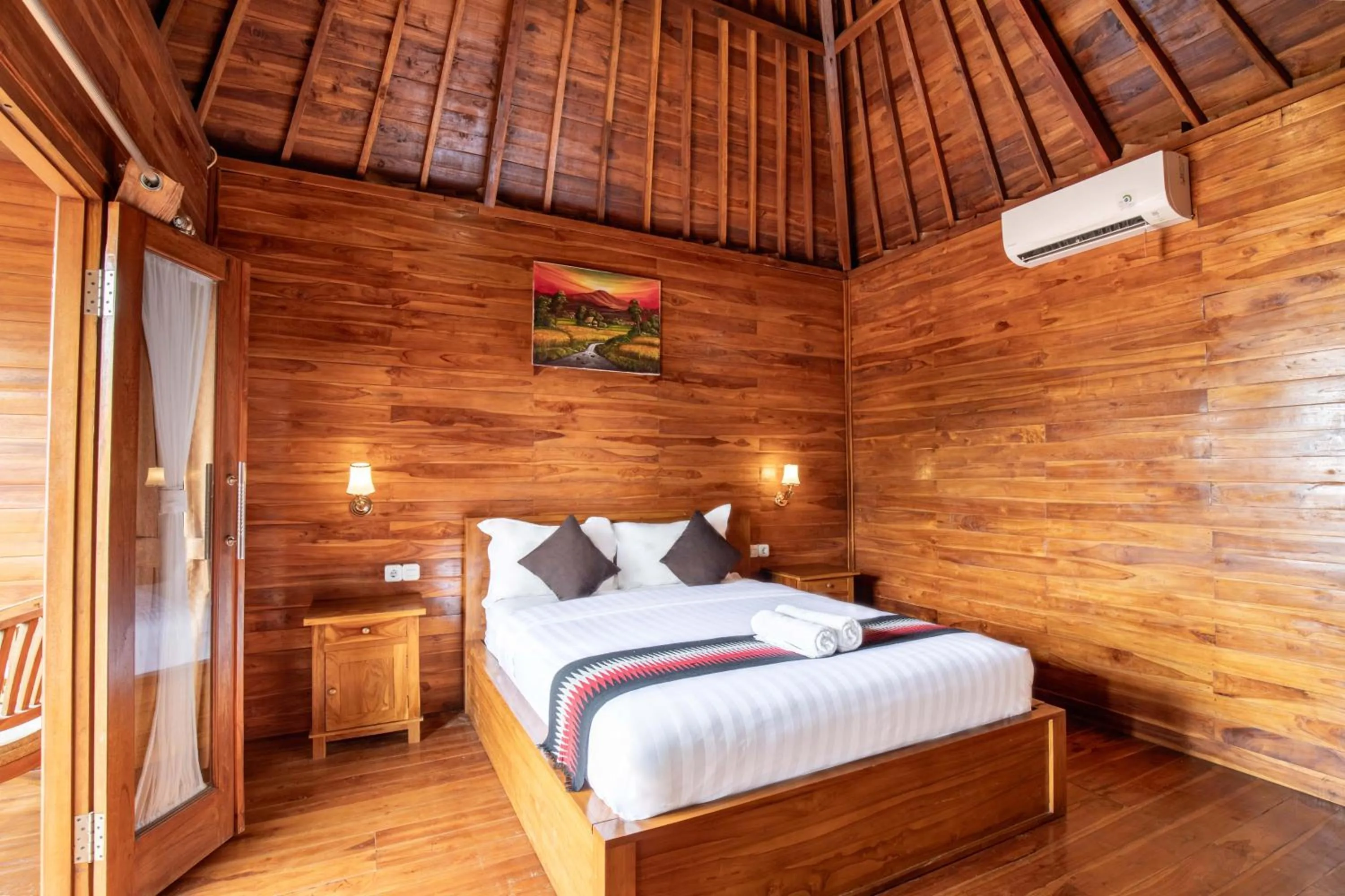 Bed in Coconut Hill Cottage