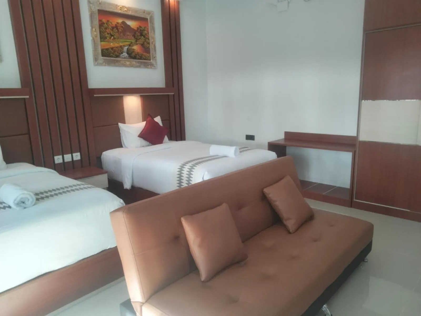 Bed in Coconut Hill Cottage