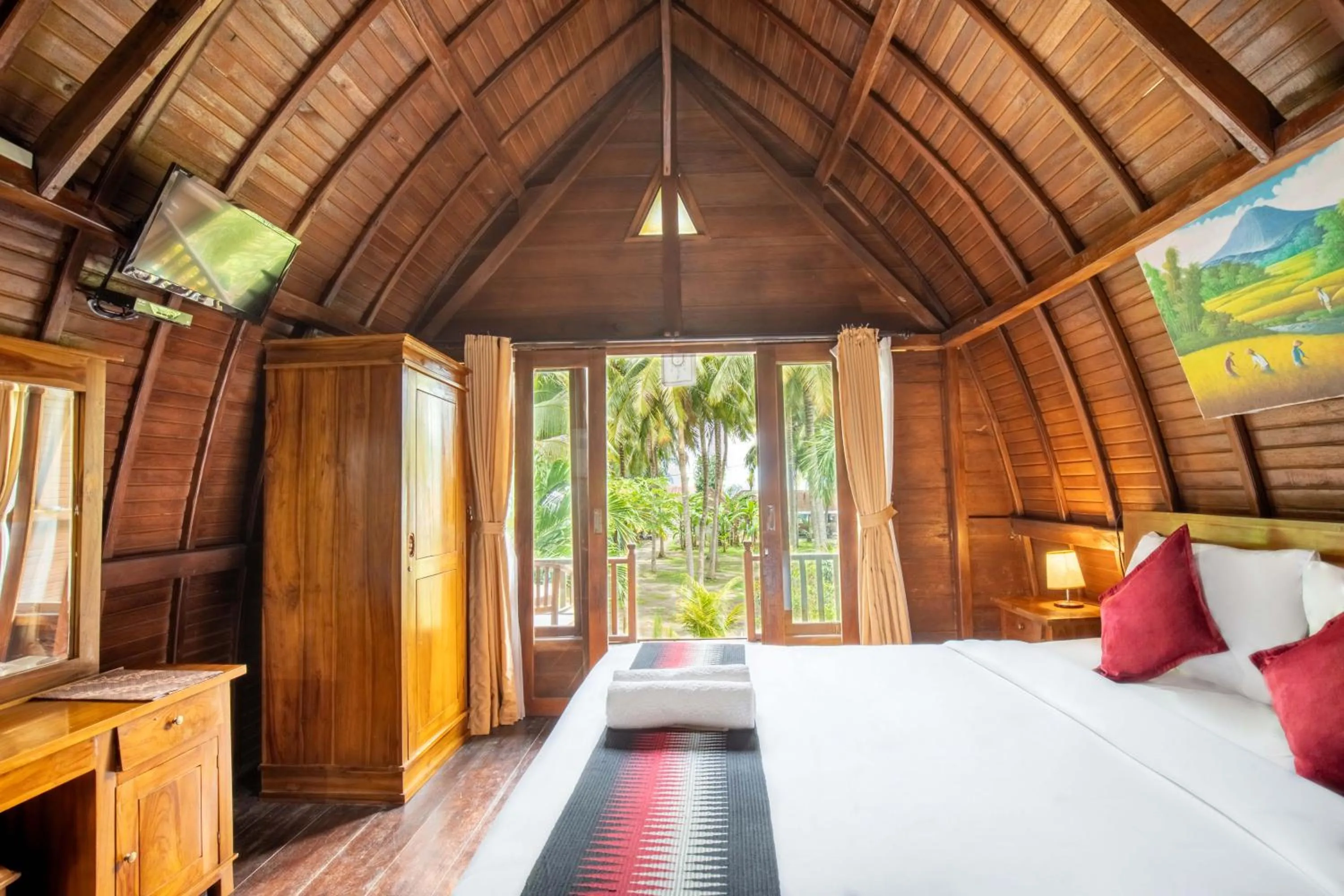 Bed in Coconut Hill Cottage