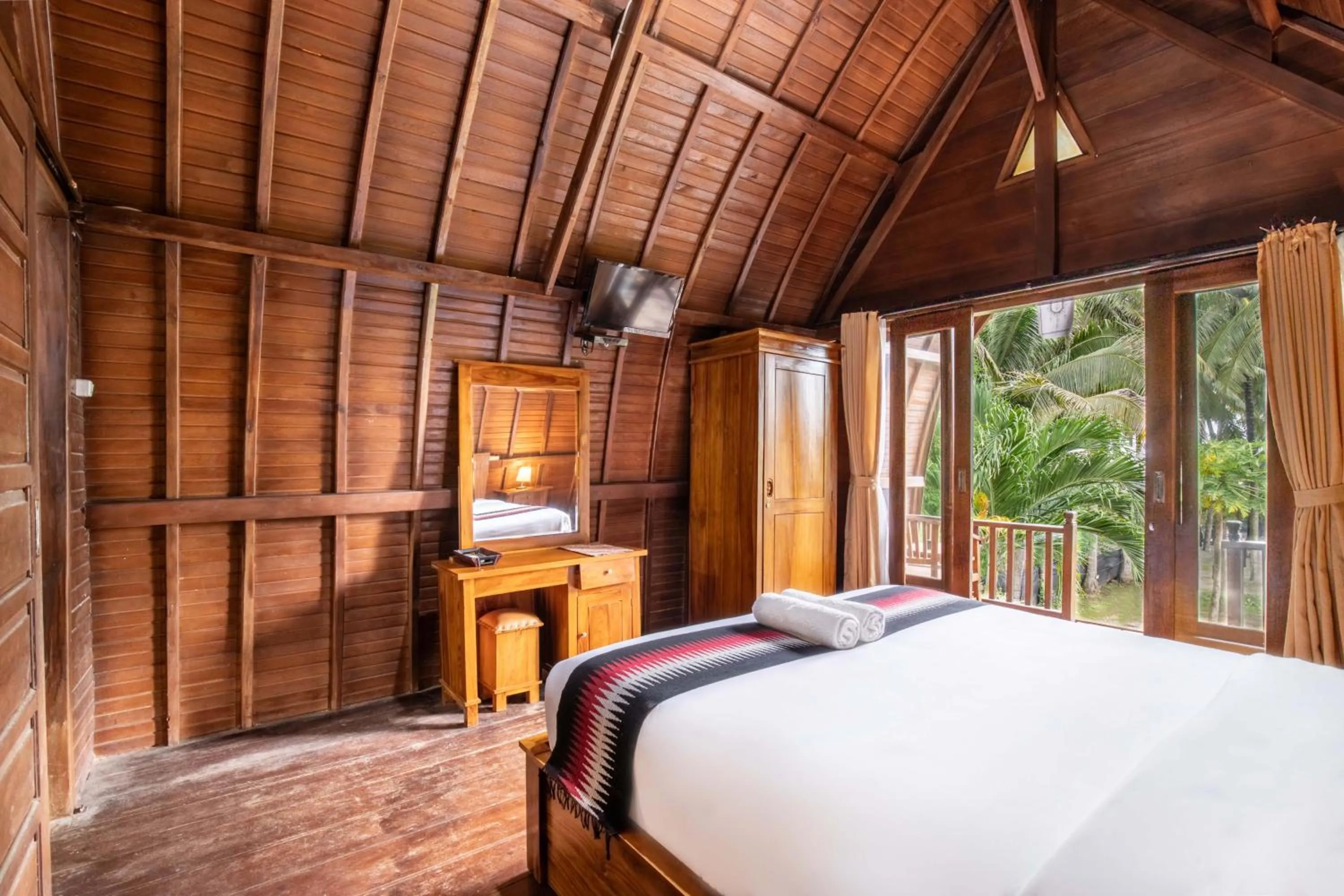 Bed in Coconut Hill Cottage