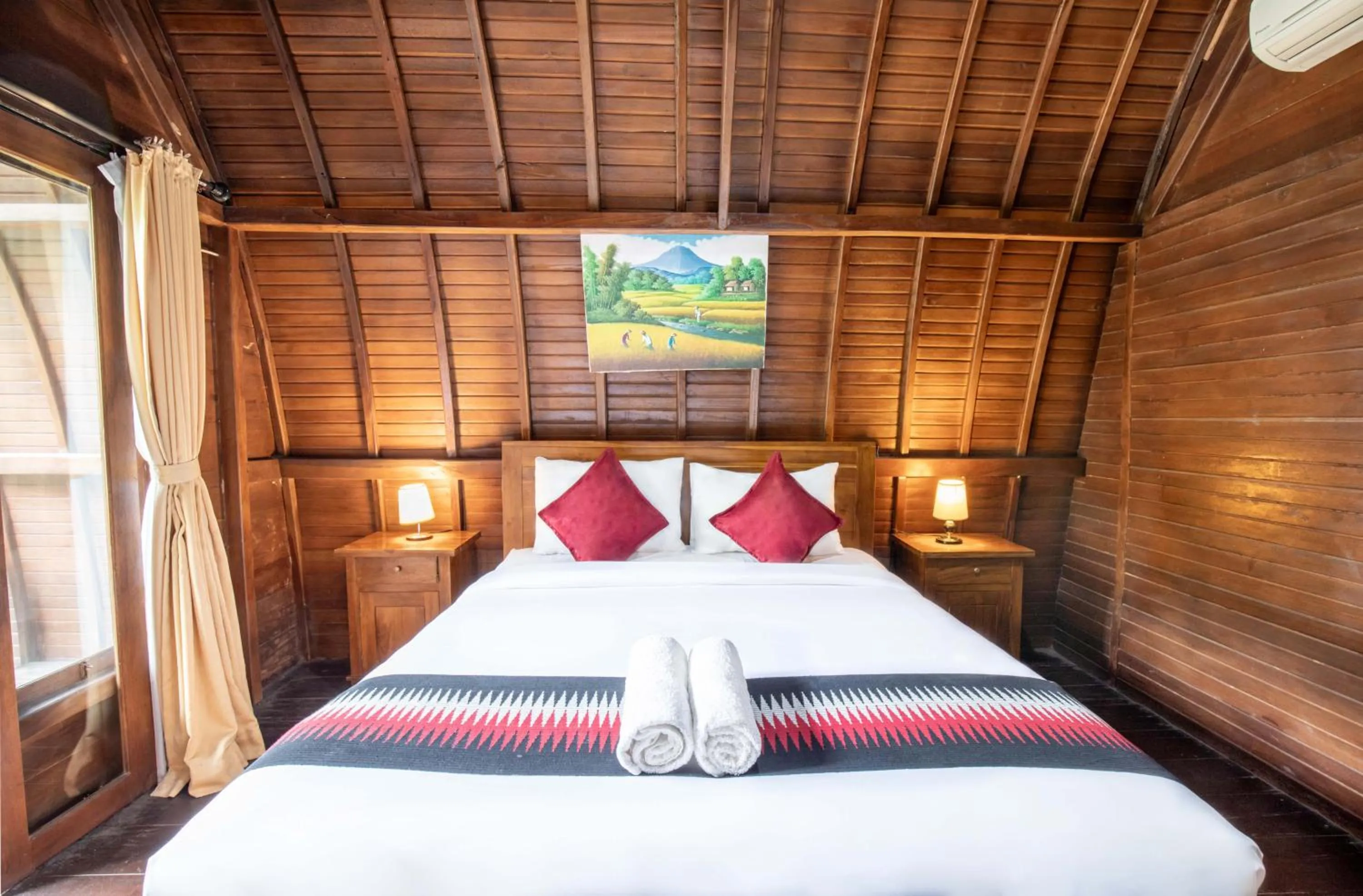 Bed in Coconut Hill Cottage