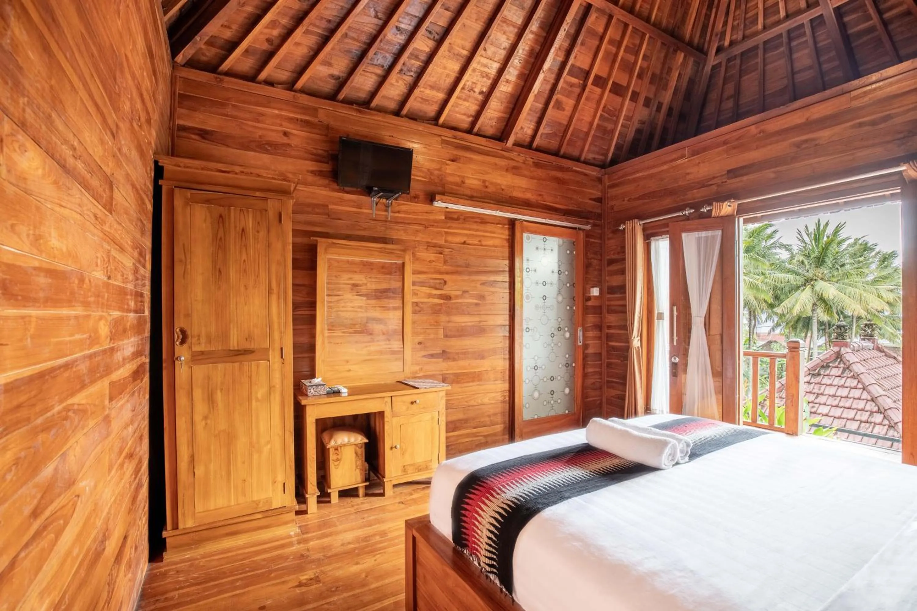 Bed in Coconut Hill Cottage