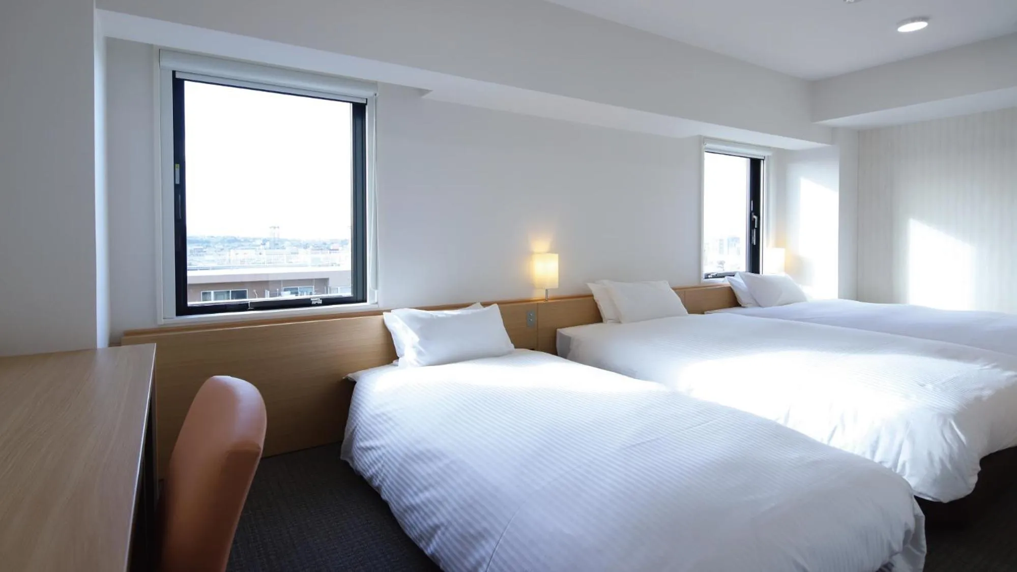 Bed in AB Hotel Kani