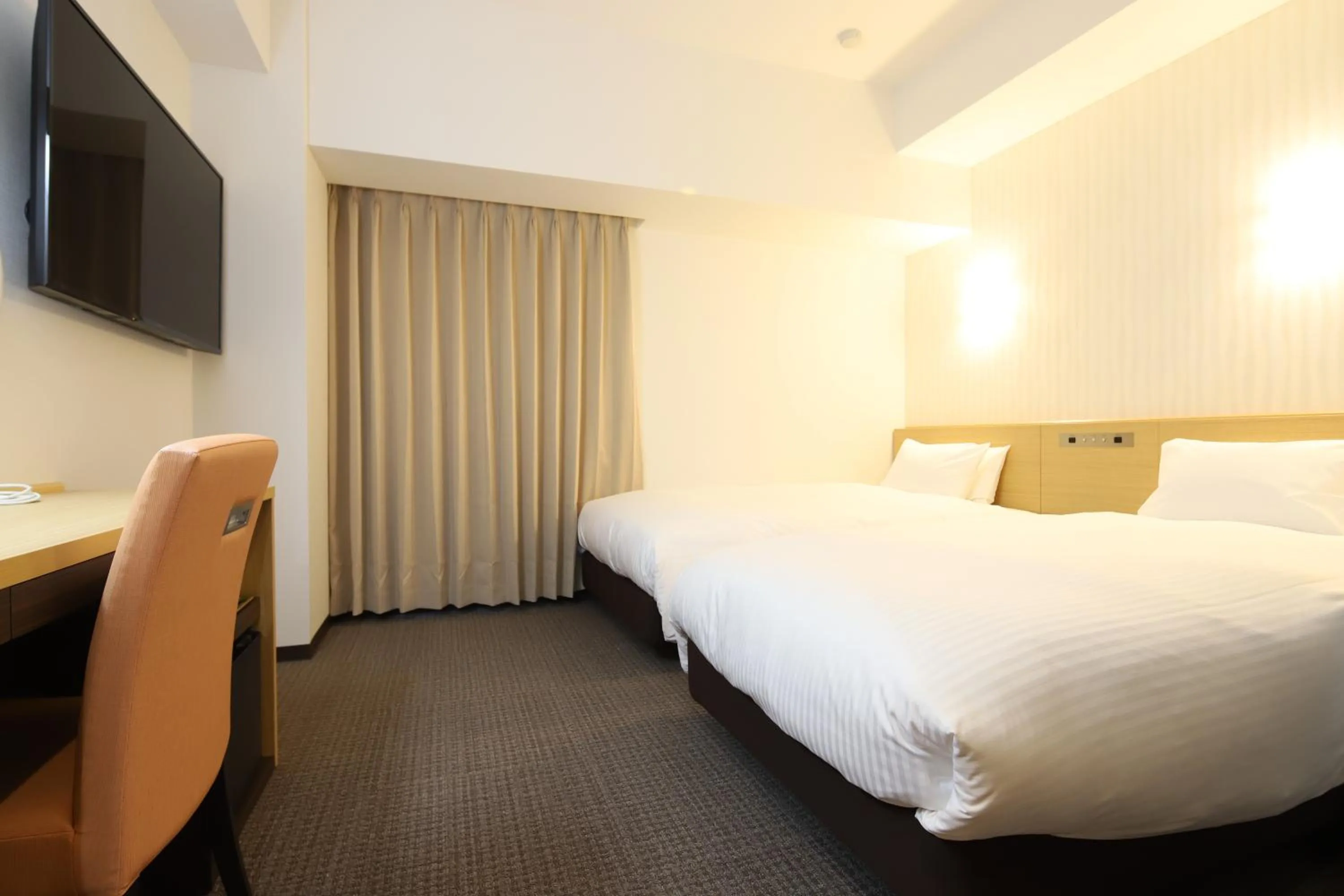 Bed in AB Hotel Kani