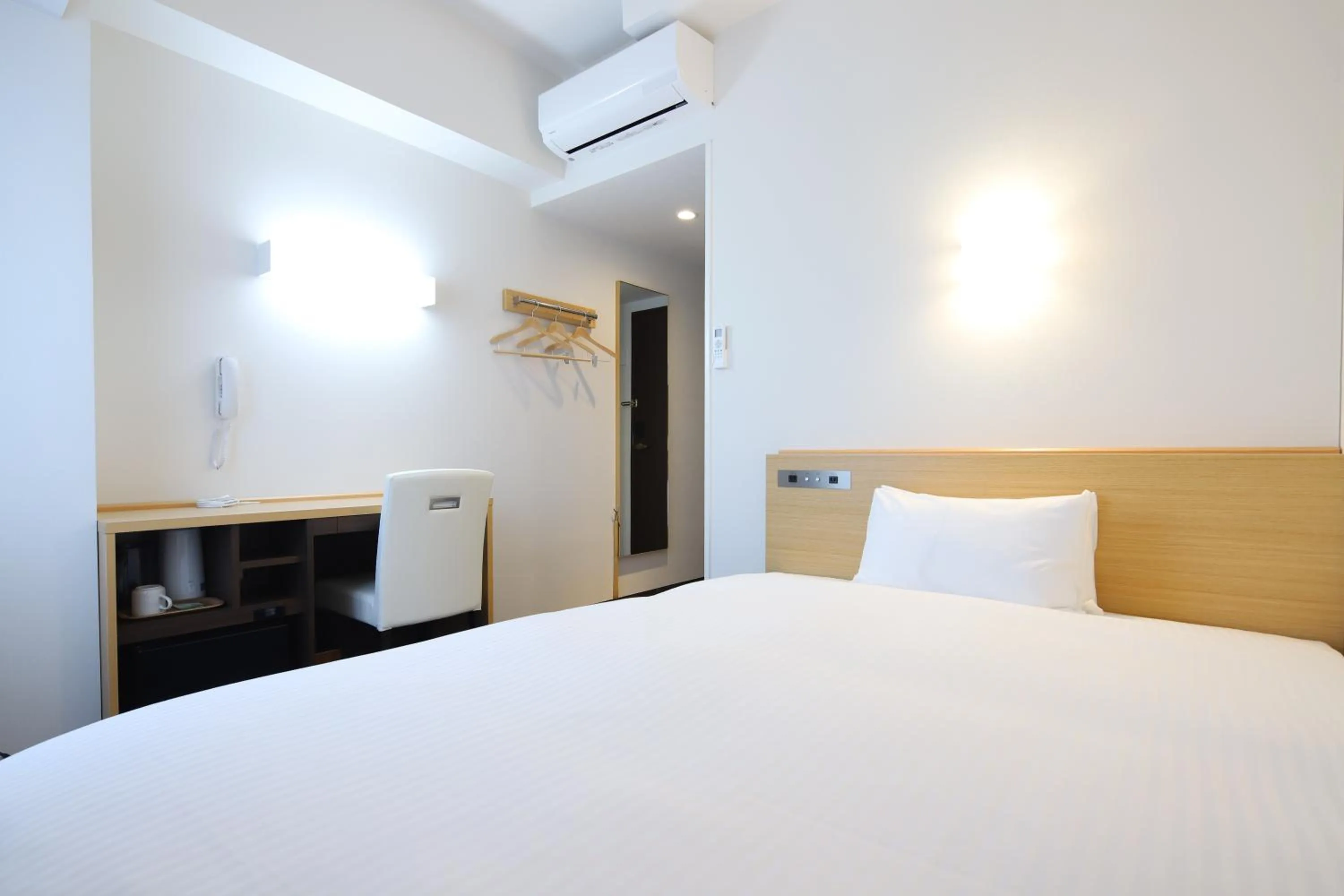 Bed in AB Hotel Kani