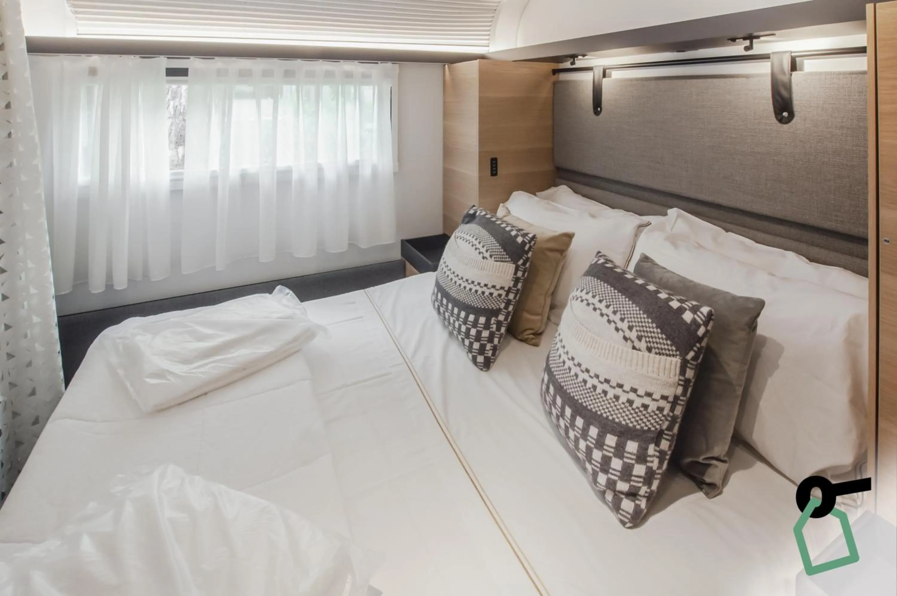 Bed in HOTIDAY Lodge Castiglione