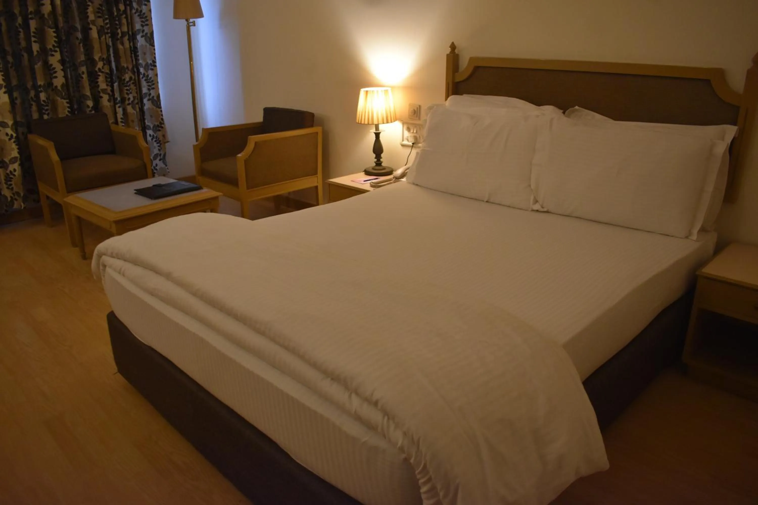 Bed in Chanakya Hotel, Patna