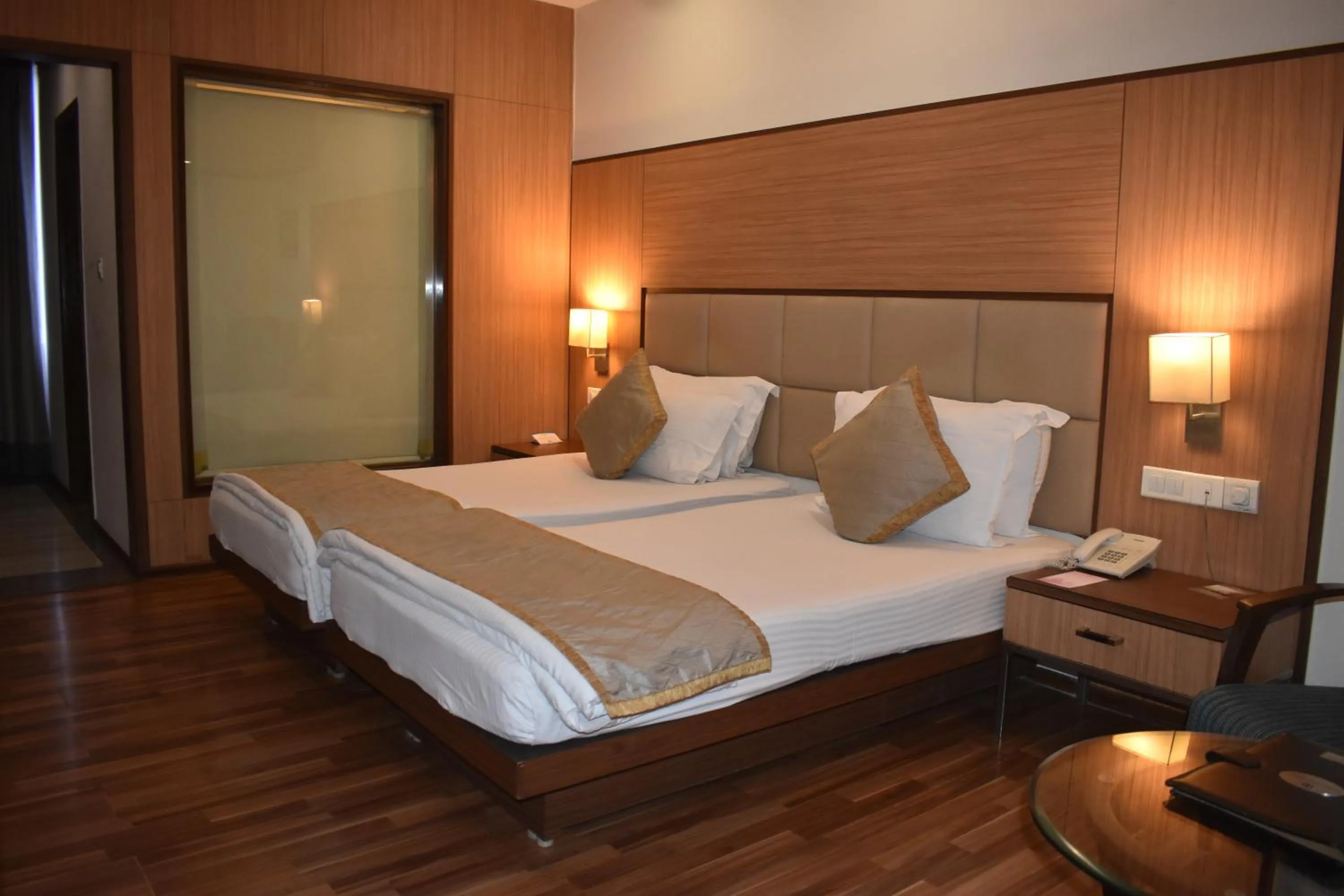 Bed in Chanakya Hotel, Patna