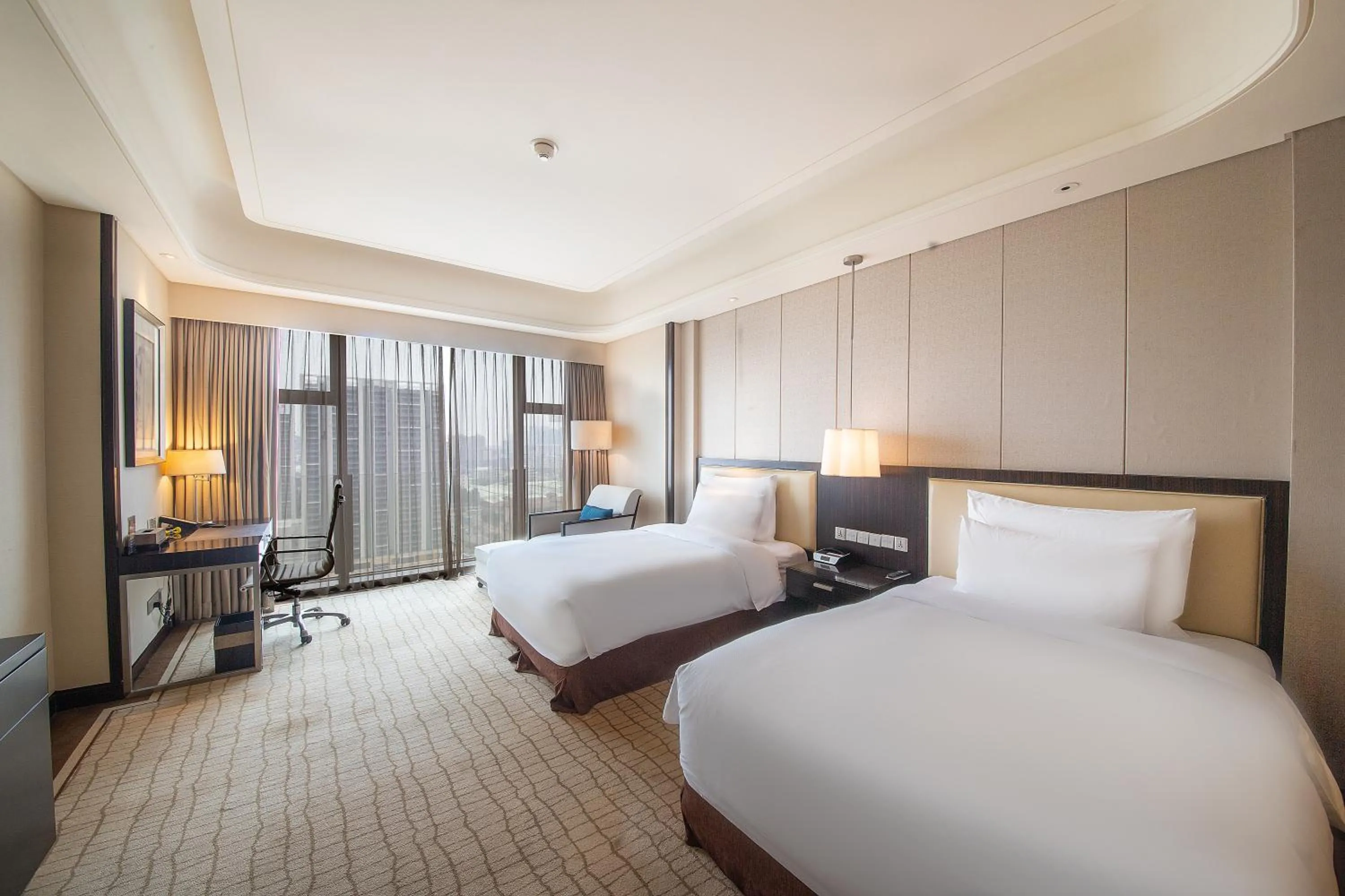 Bed in Junluxe Hotel Guangzhou Zengcheng-Free Shuttle Bus For Canton Fair