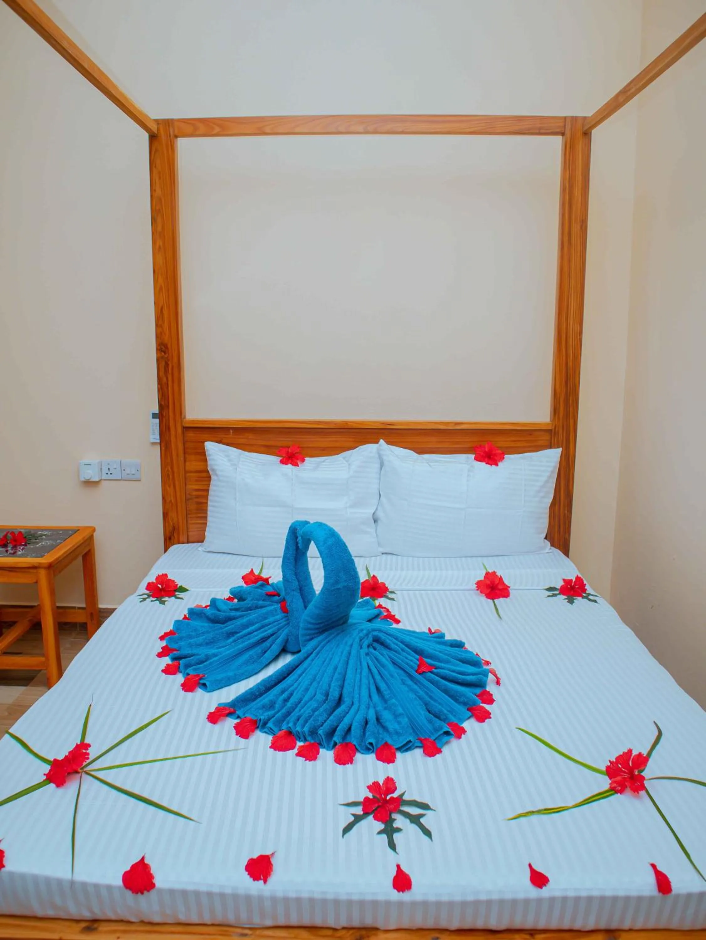 Bed in Tumaini Bungalows