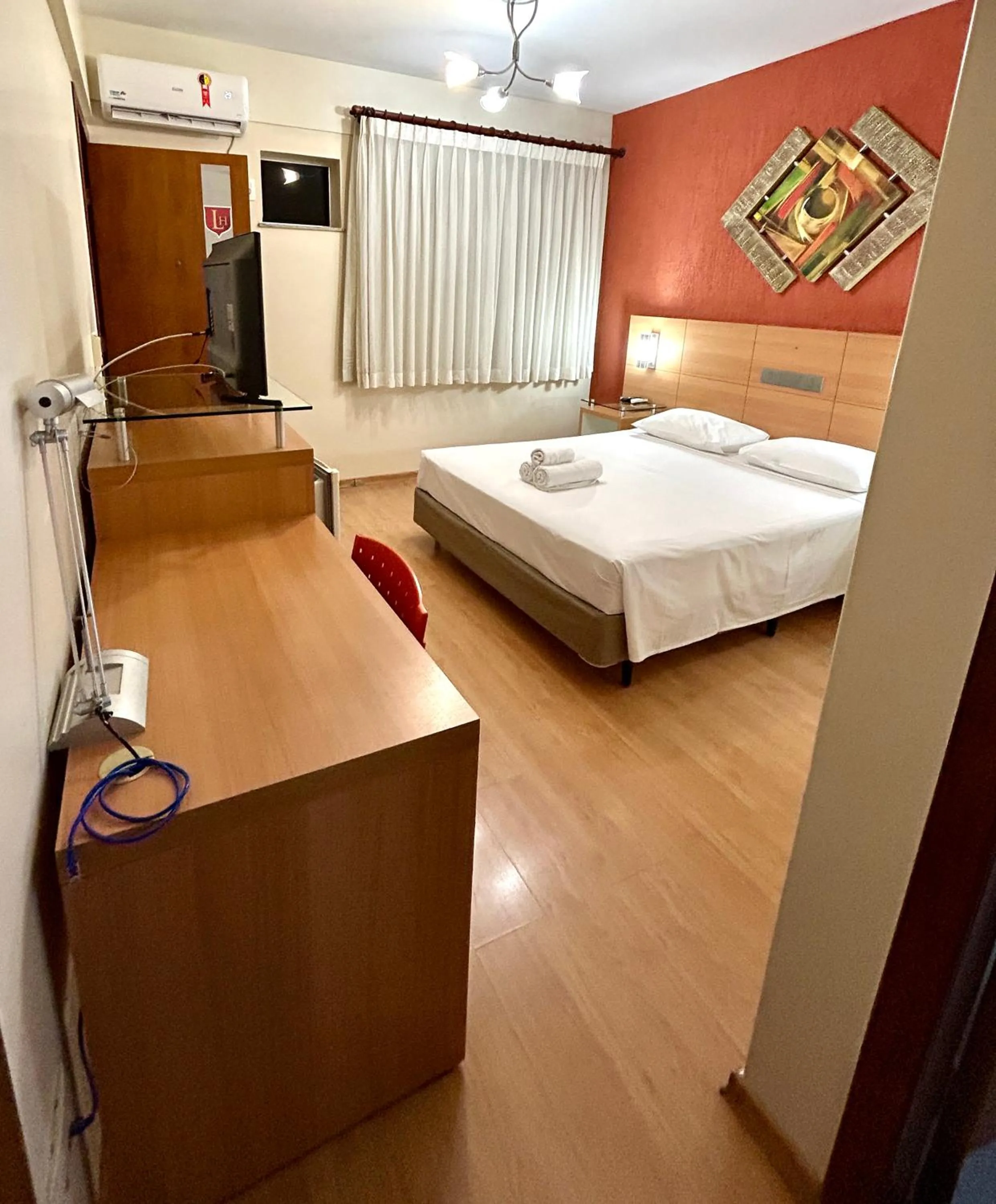 Photo of the whole room, Bed in Líber Hotel Nova Serrana - Conforto na Rota da BR-262