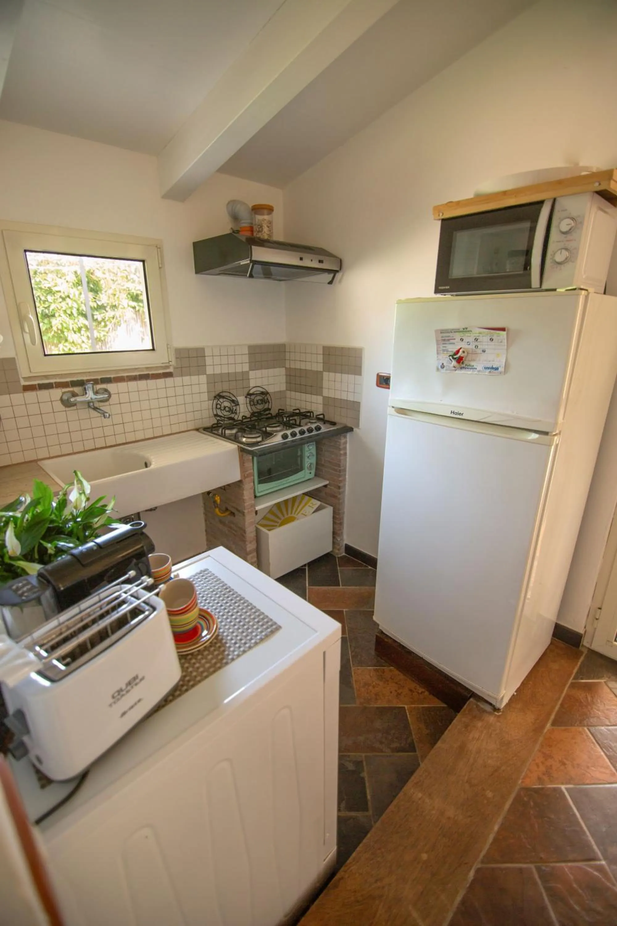 Kitchen or kitchenette in Villa LA CESA & Villino LA CASETTA Holiday Houses CON JACUZZI