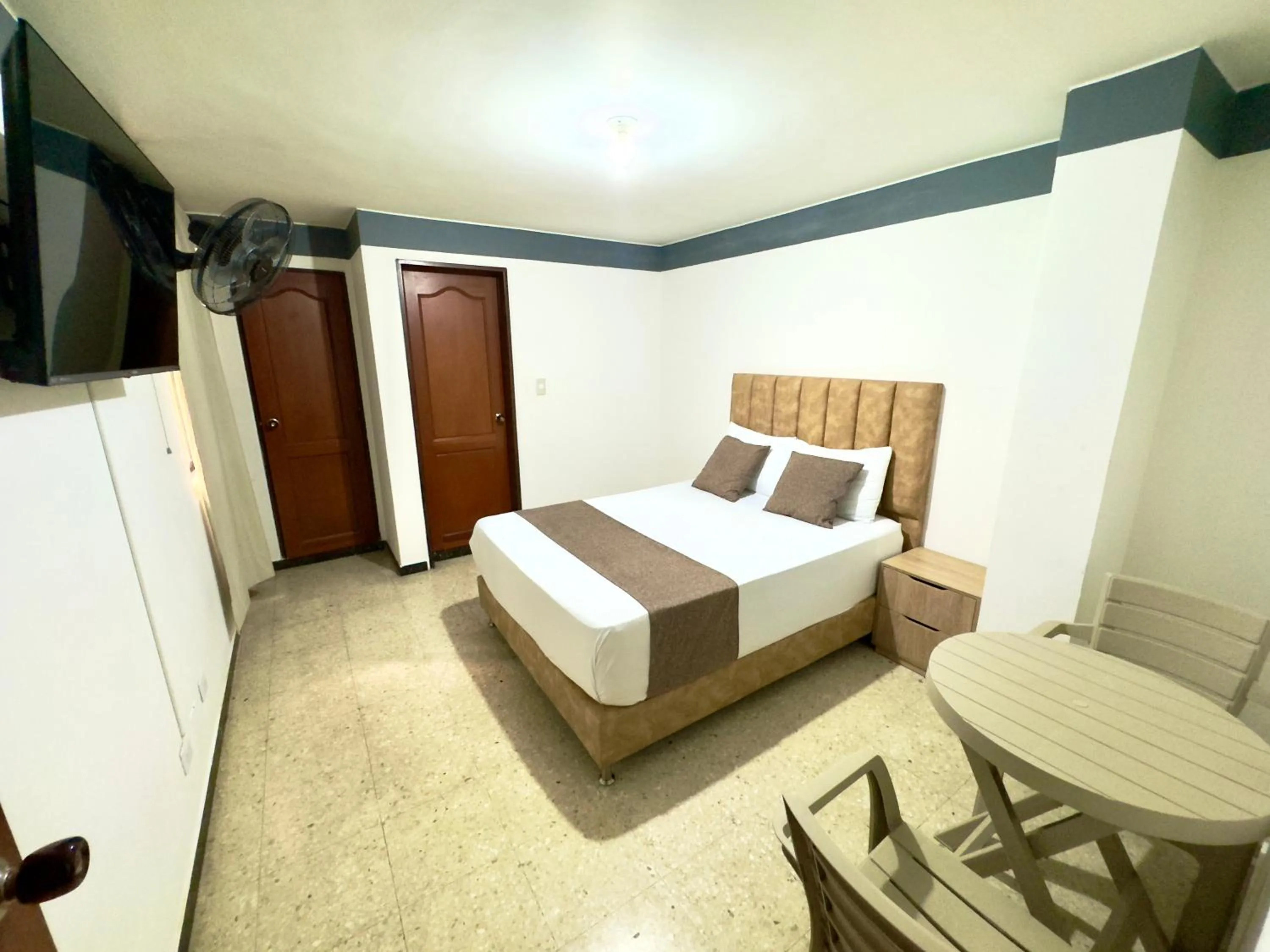 Bed in Hotel Pereira Central