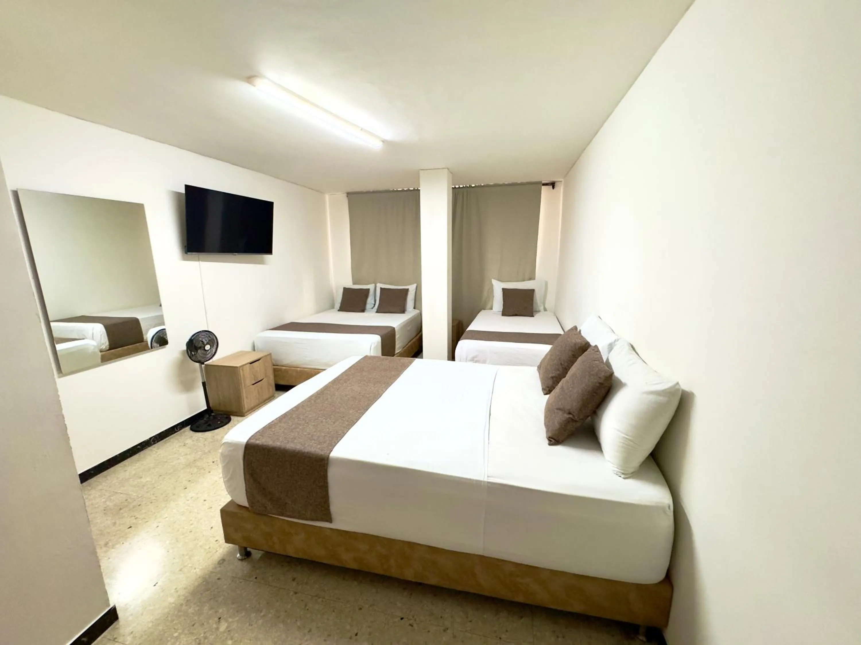 Bed in Hotel Pereira Central