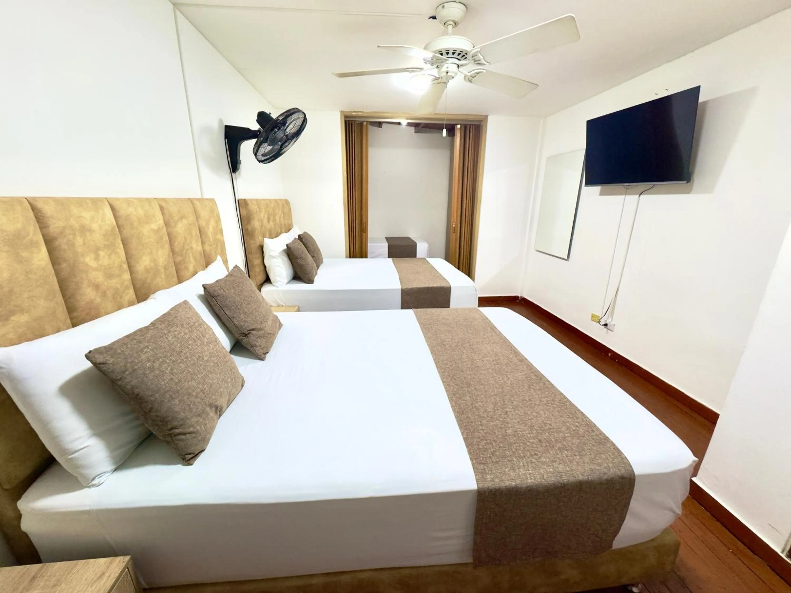 Bed in Hotel Pereira Central