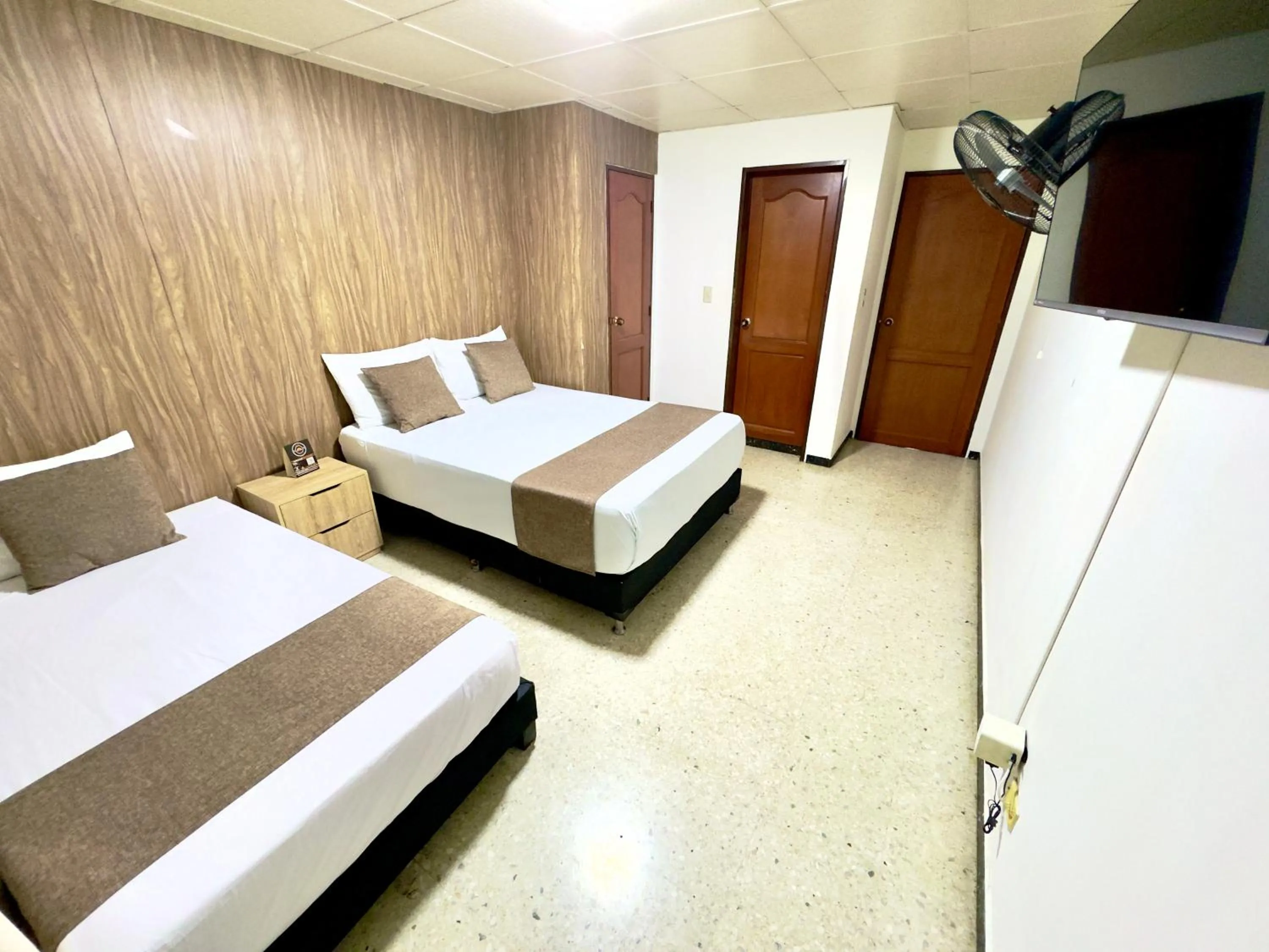 Bed in Hotel Pereira Central