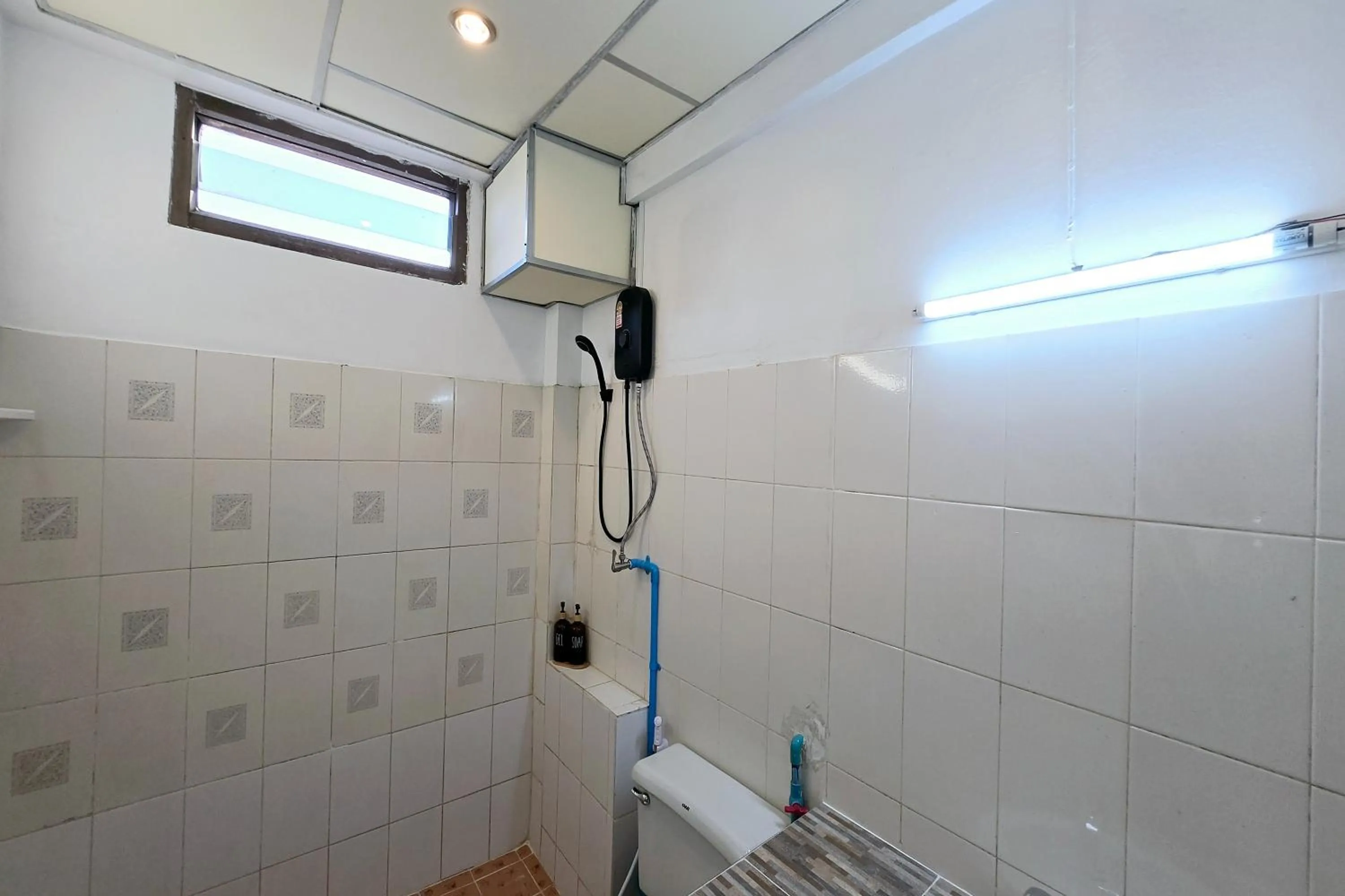 Shower in MT Friend Home & Hostel