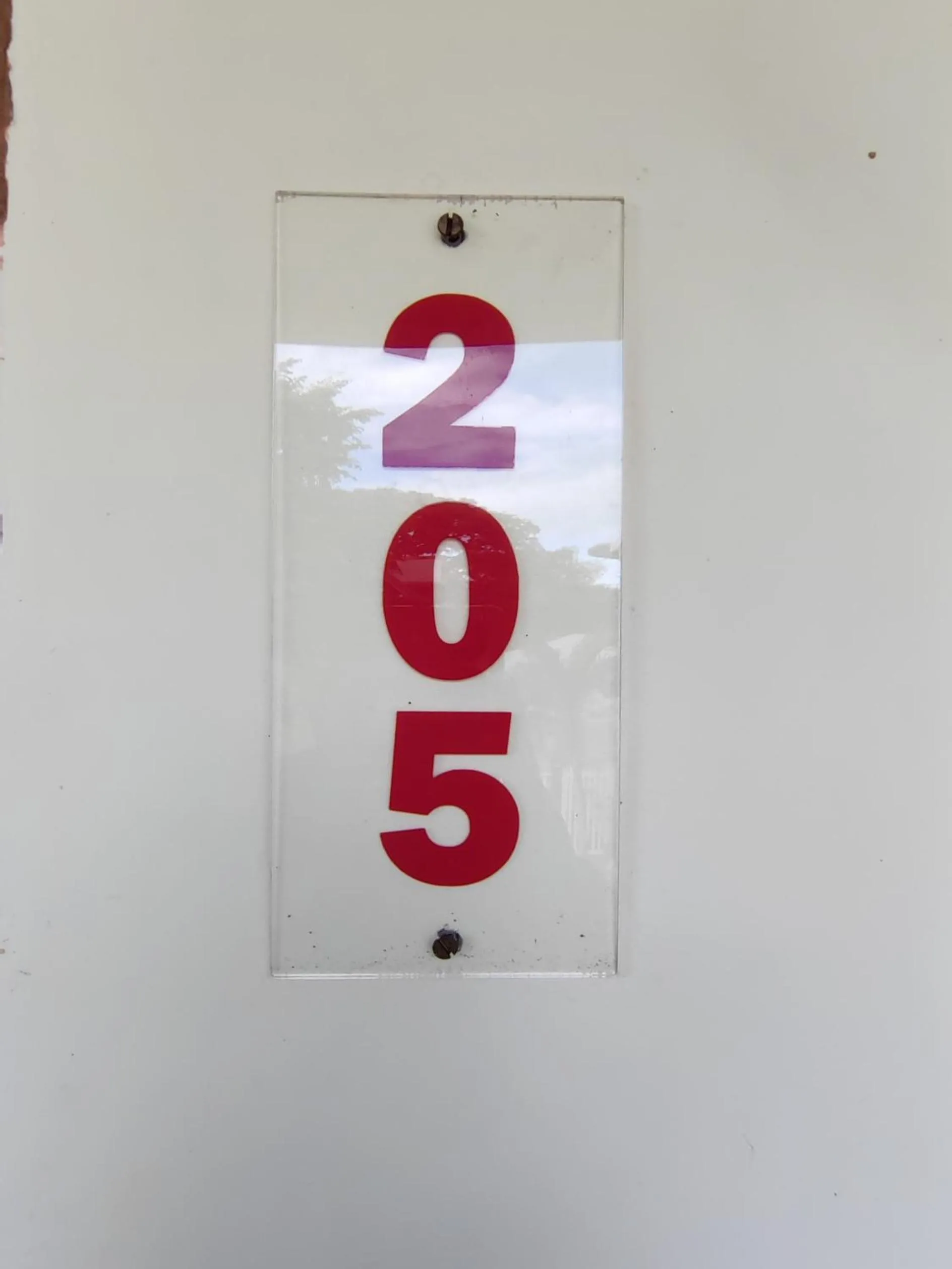 Text overlay in Pring Pension House Puerto Princesa