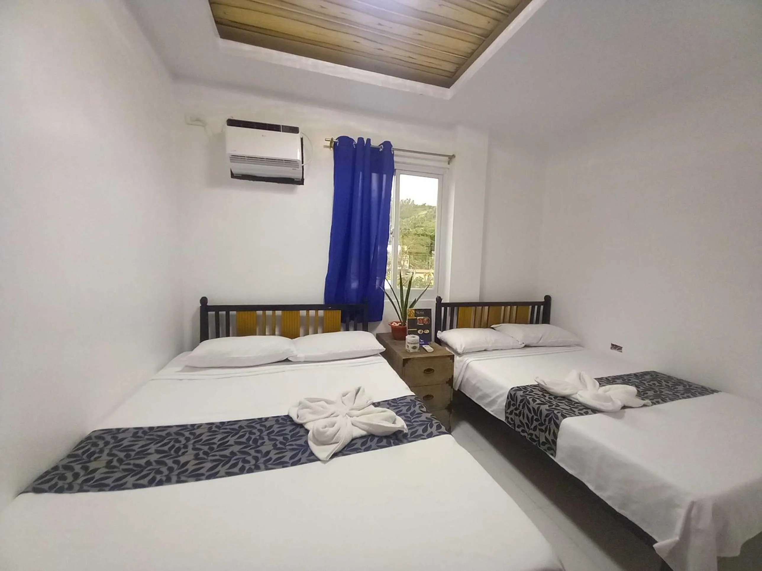 Bed in OYO 1130 Thrivers Hometel