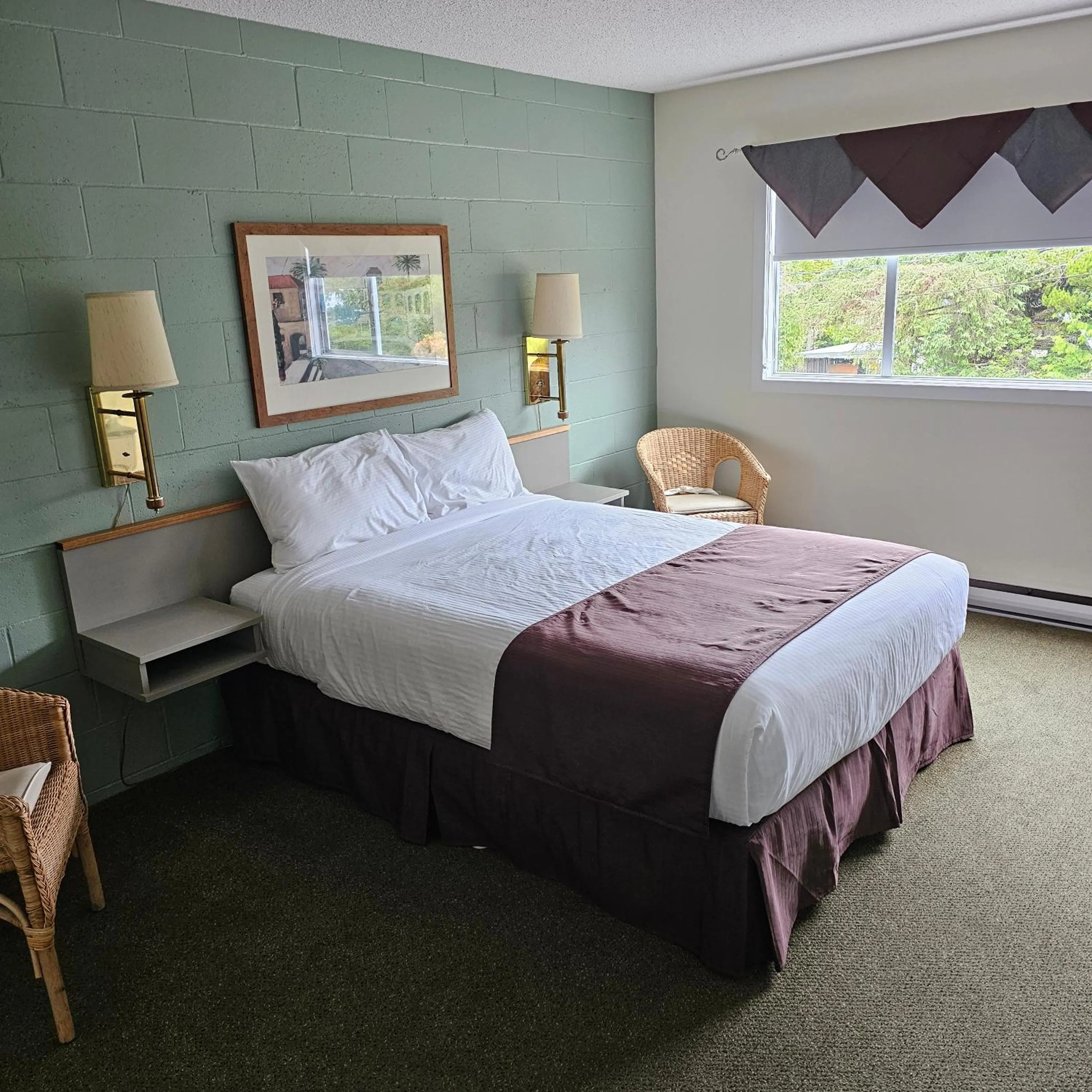 Bed in Pacific Rim Motel