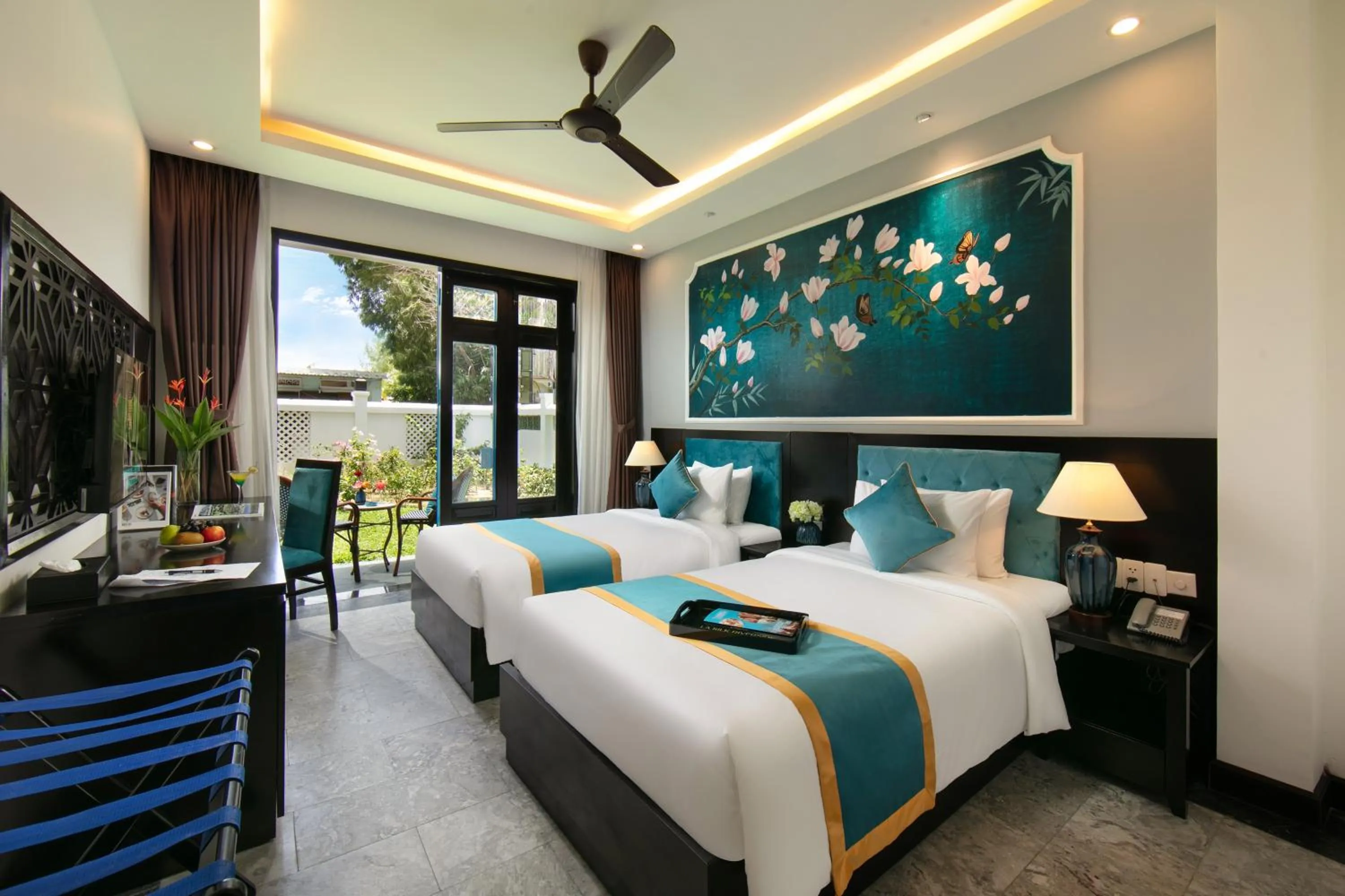 Bed in Silk River Hoi An Hotel & Spa