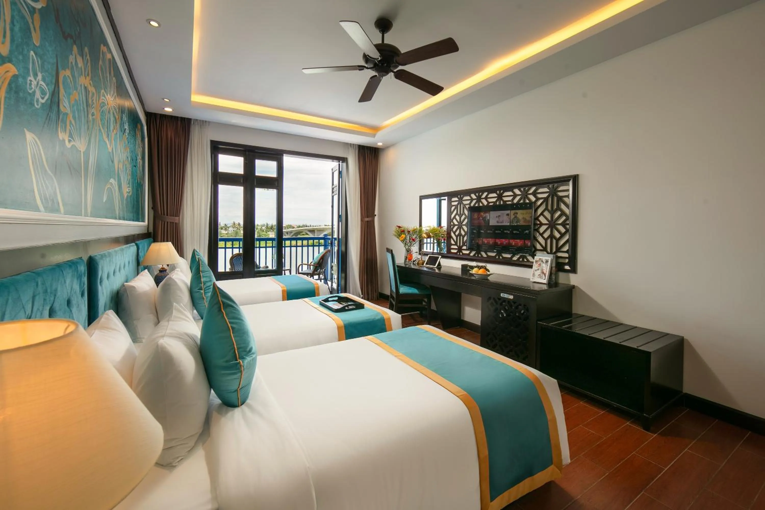 Bed in Silk River Hoi An Hotel & Spa