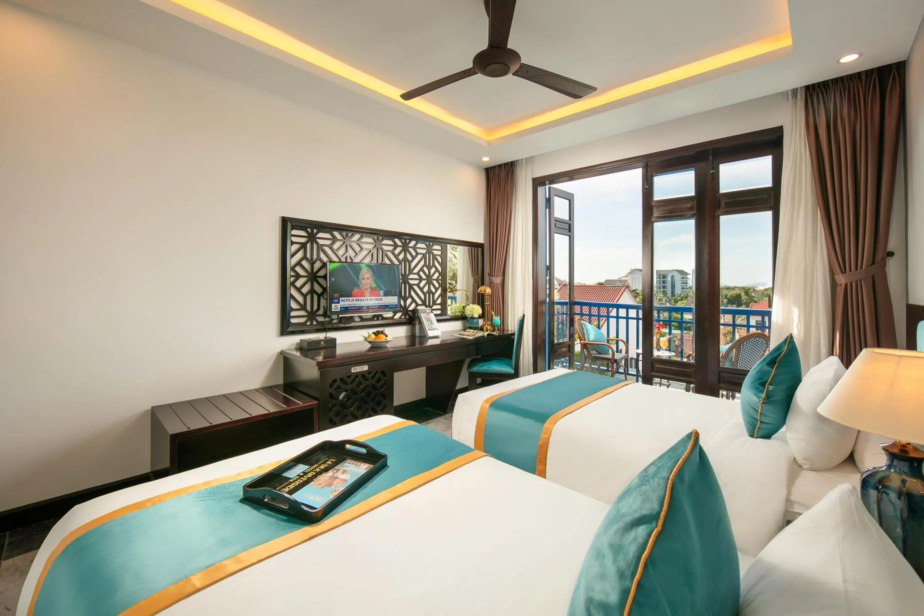 Bed in Silk River Hoi An Hotel & Spa