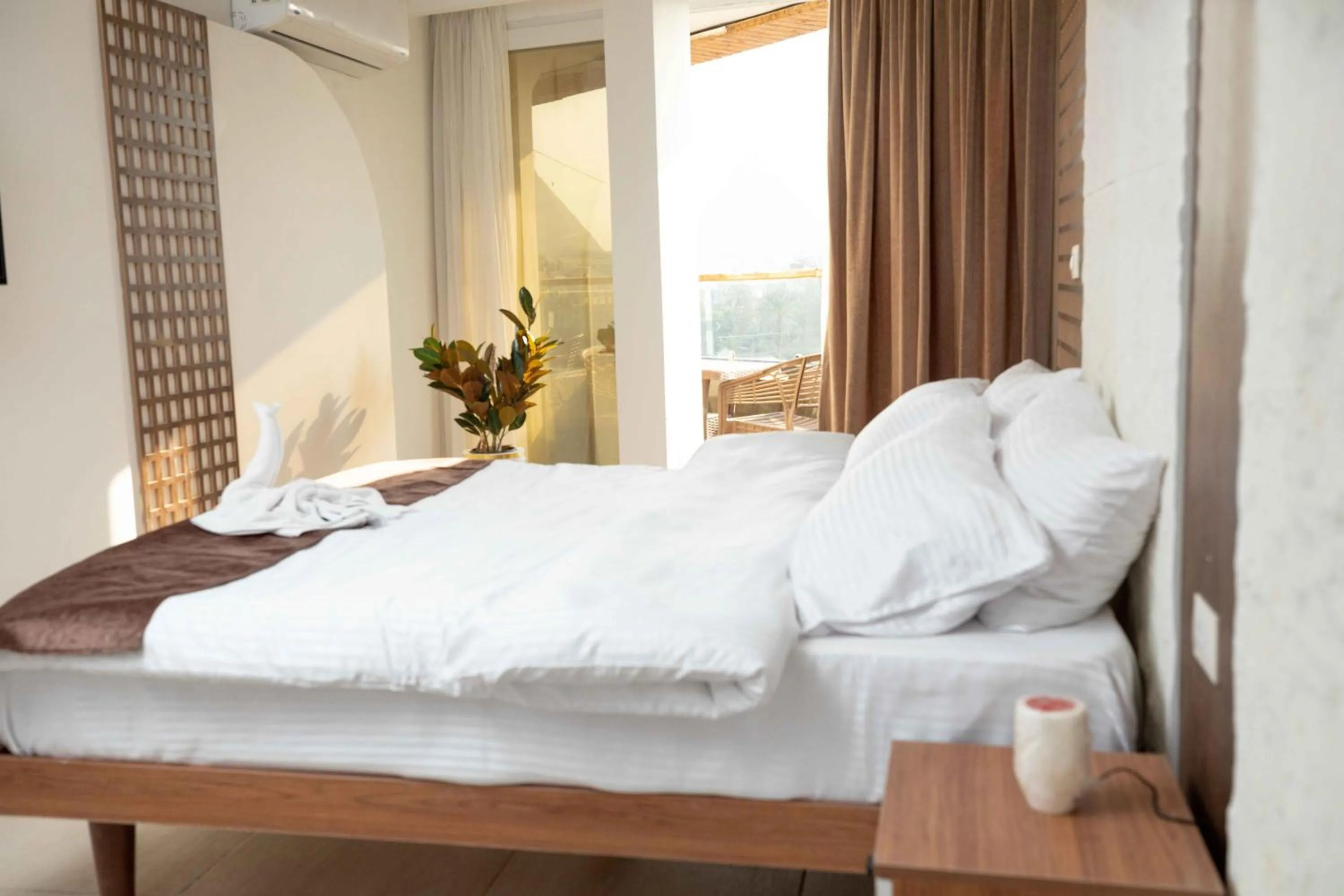 Bed in Eyes Of Egypt Pyramids View Boutique Hotel