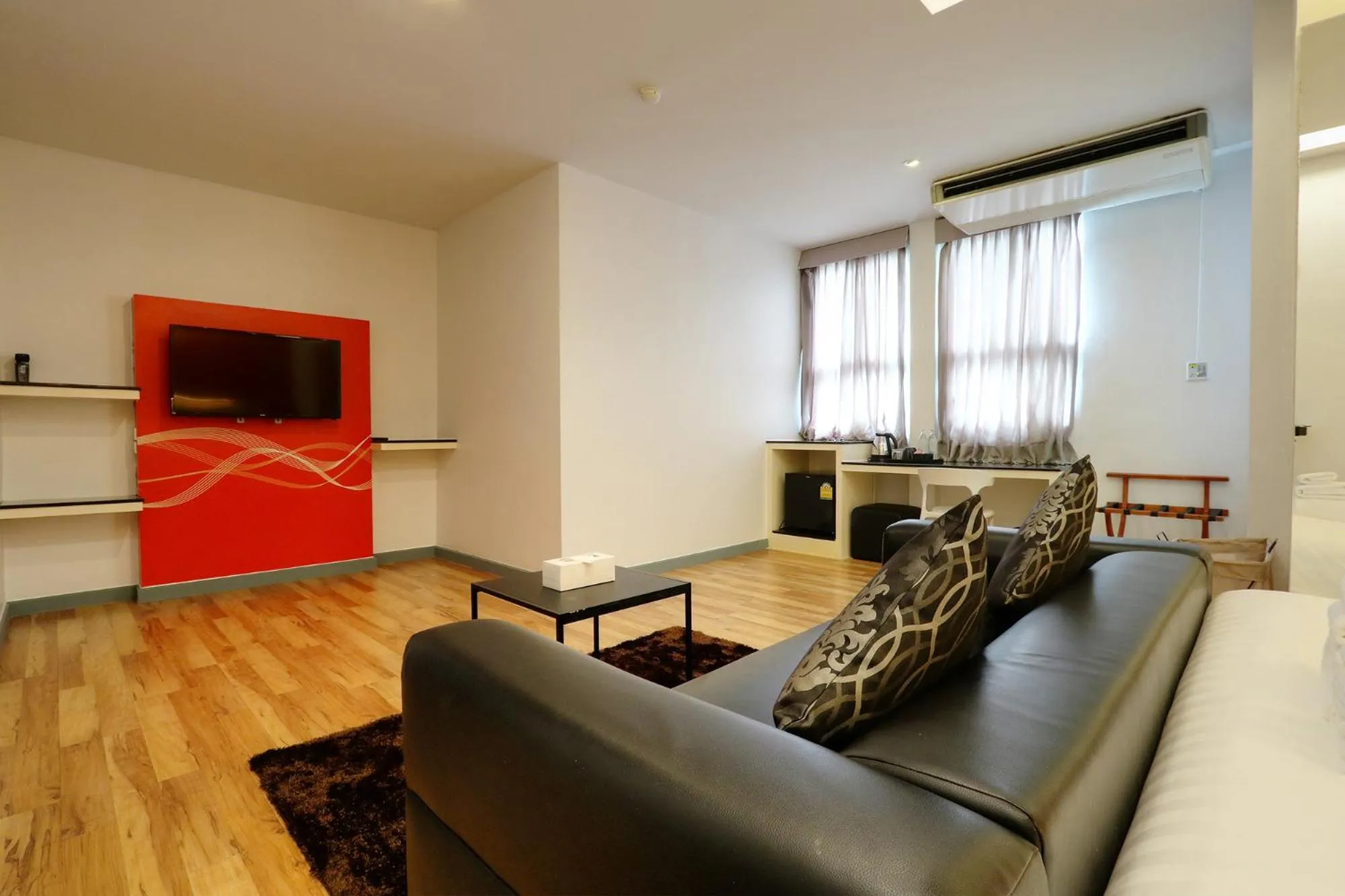 Living room in Klassique Sukhumvit Hotel