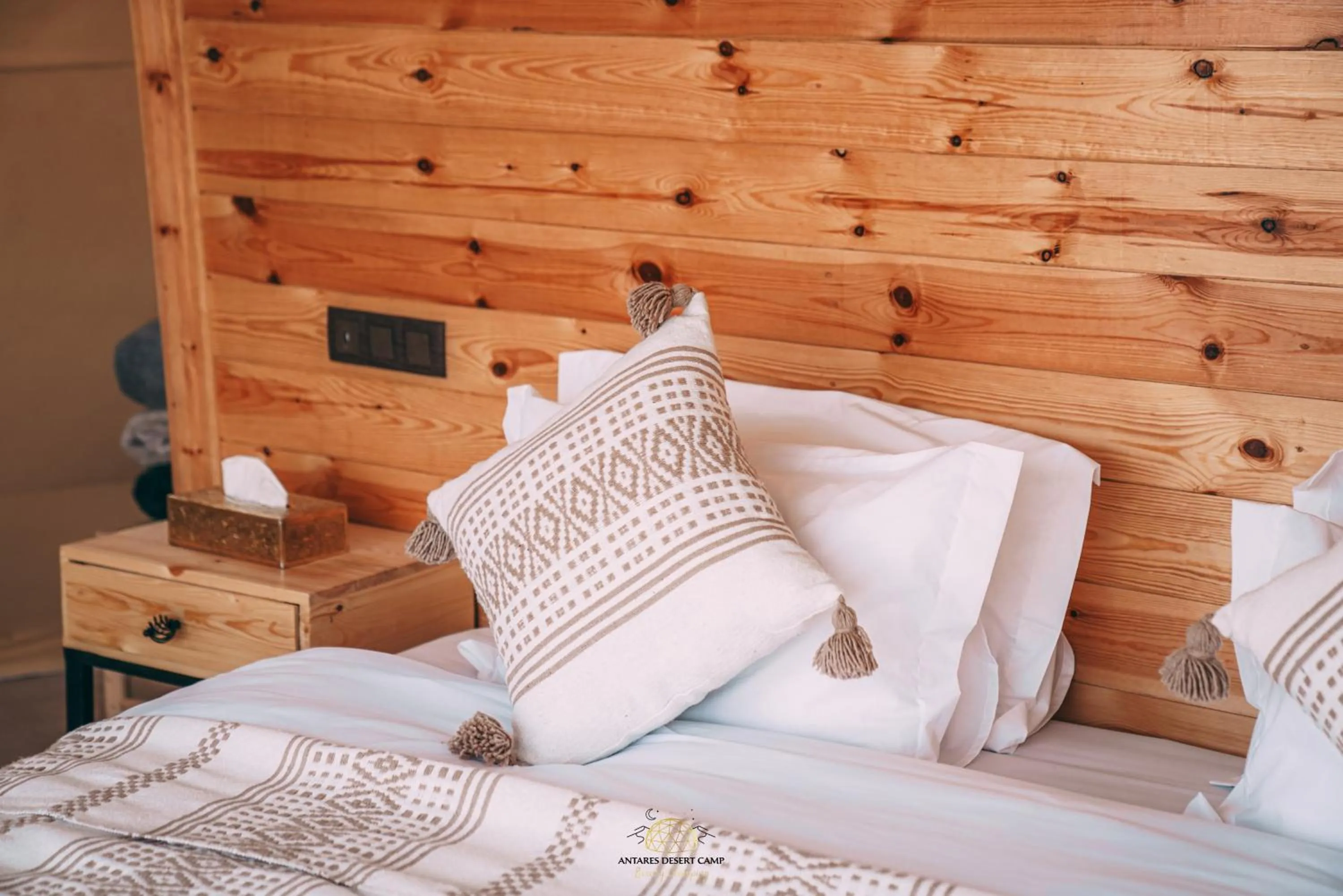 Bed in Antares Desert Camp