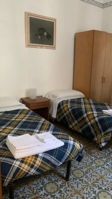 Bed in Albergo Pensione Ardenza SELF CHECK-IN