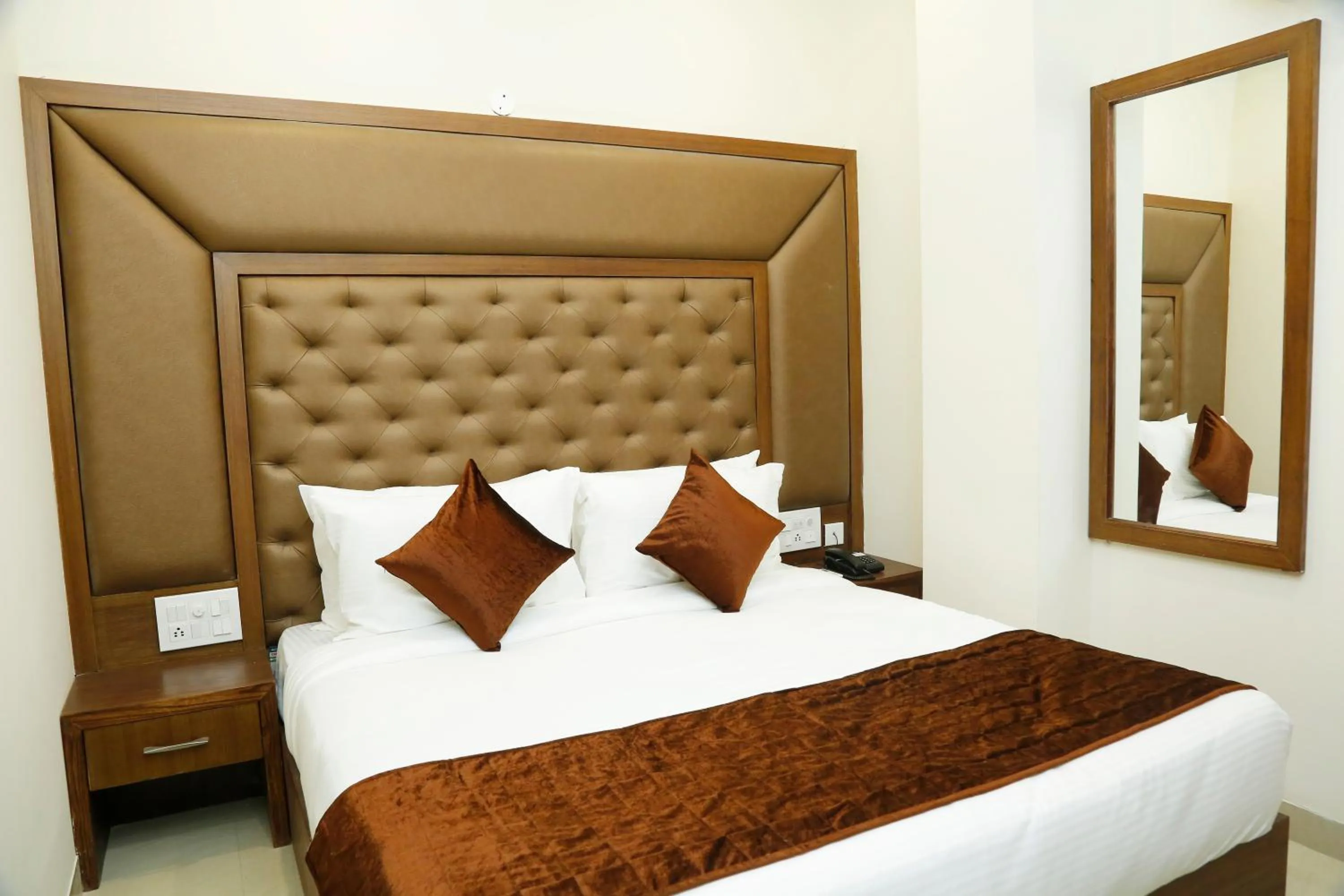 Bed in Hotel Bahl Regency