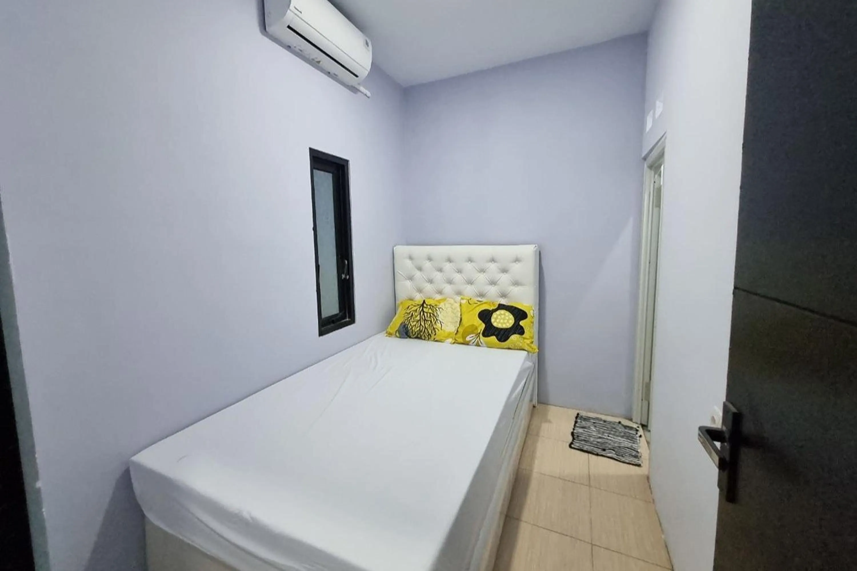 Bed in Ardafa Inn & Villa