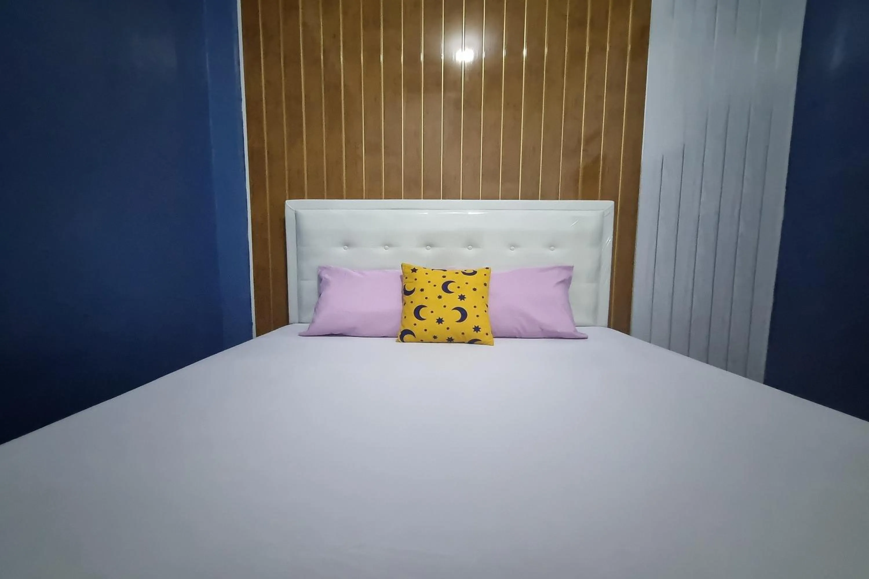 Bed in Ardafa Inn & Villa