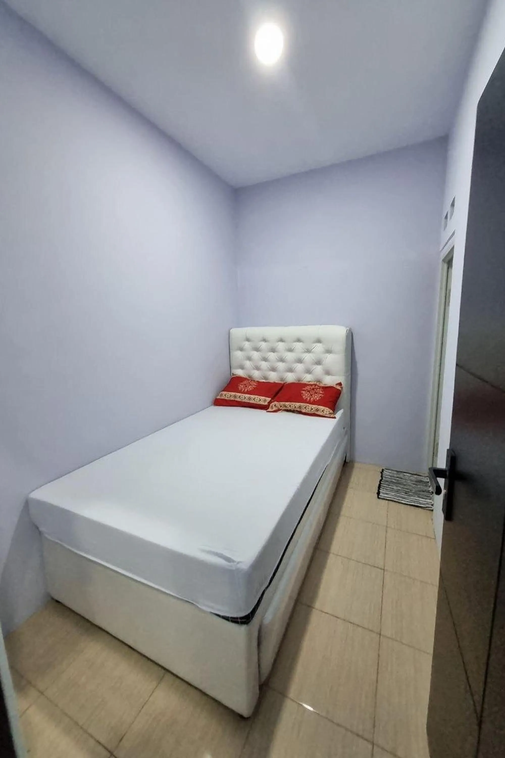 Bed in Ardafa Inn & Villa