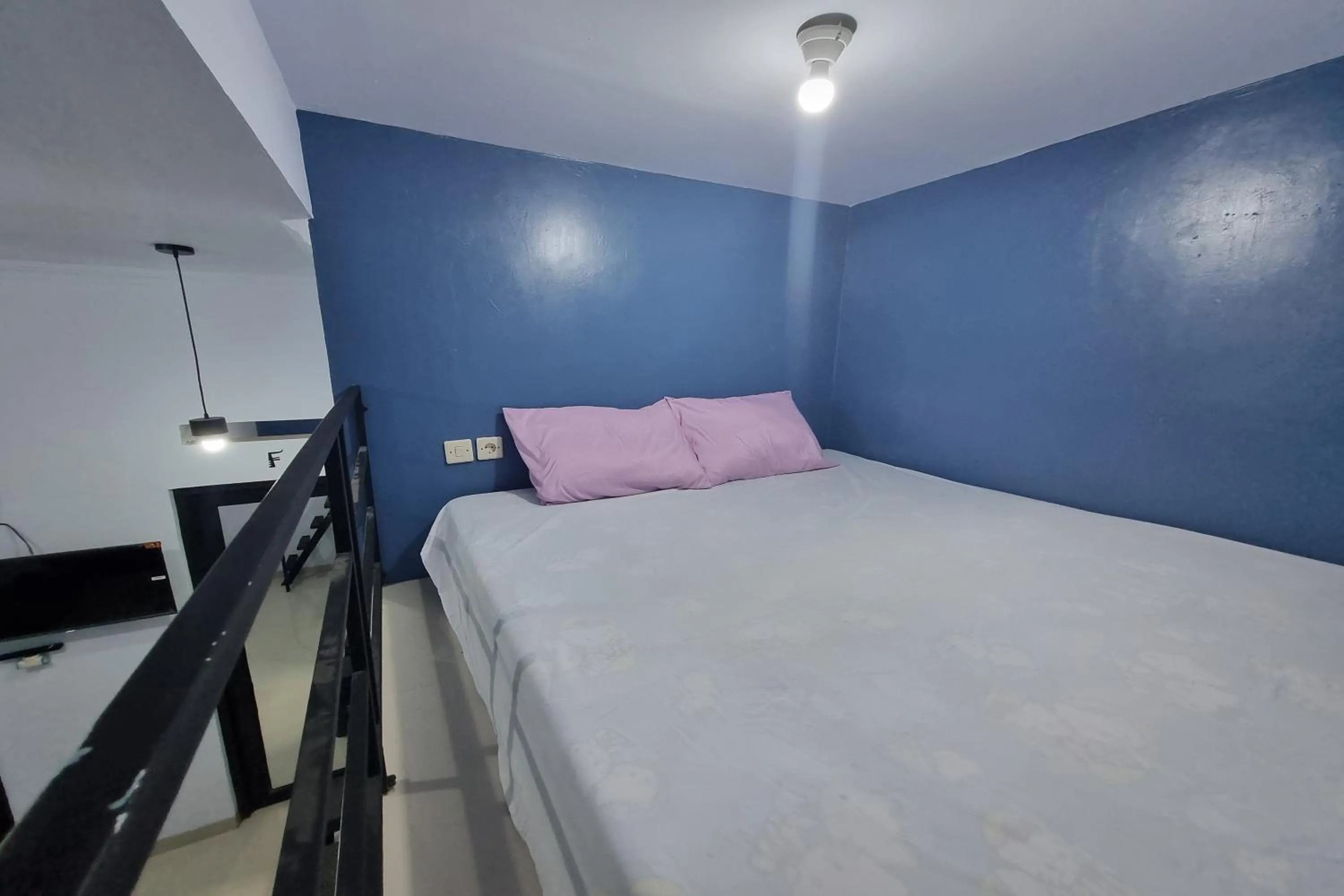 Bed in Ardafa Inn & Villa