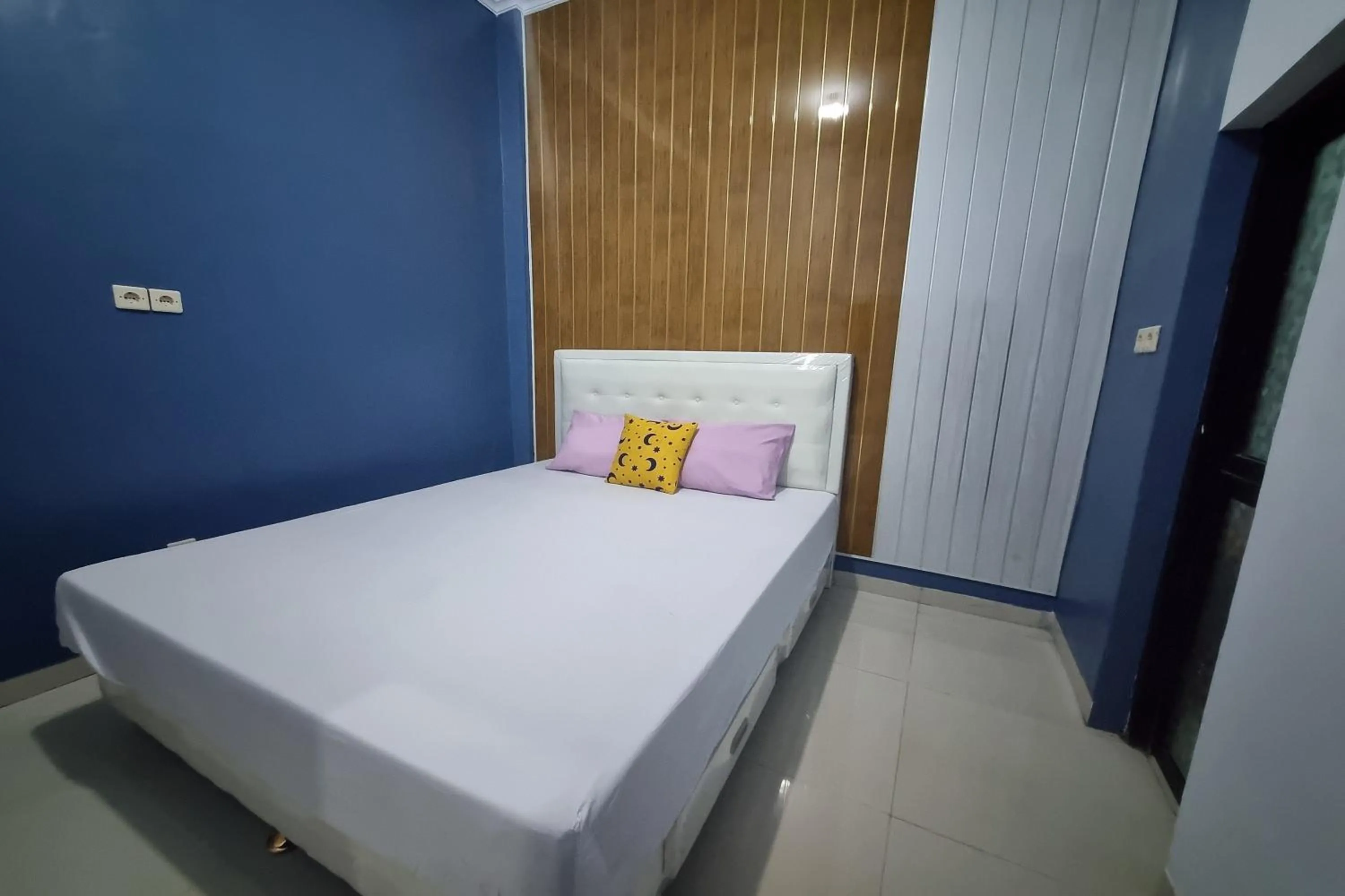 Bed in Ardafa Inn & Villa