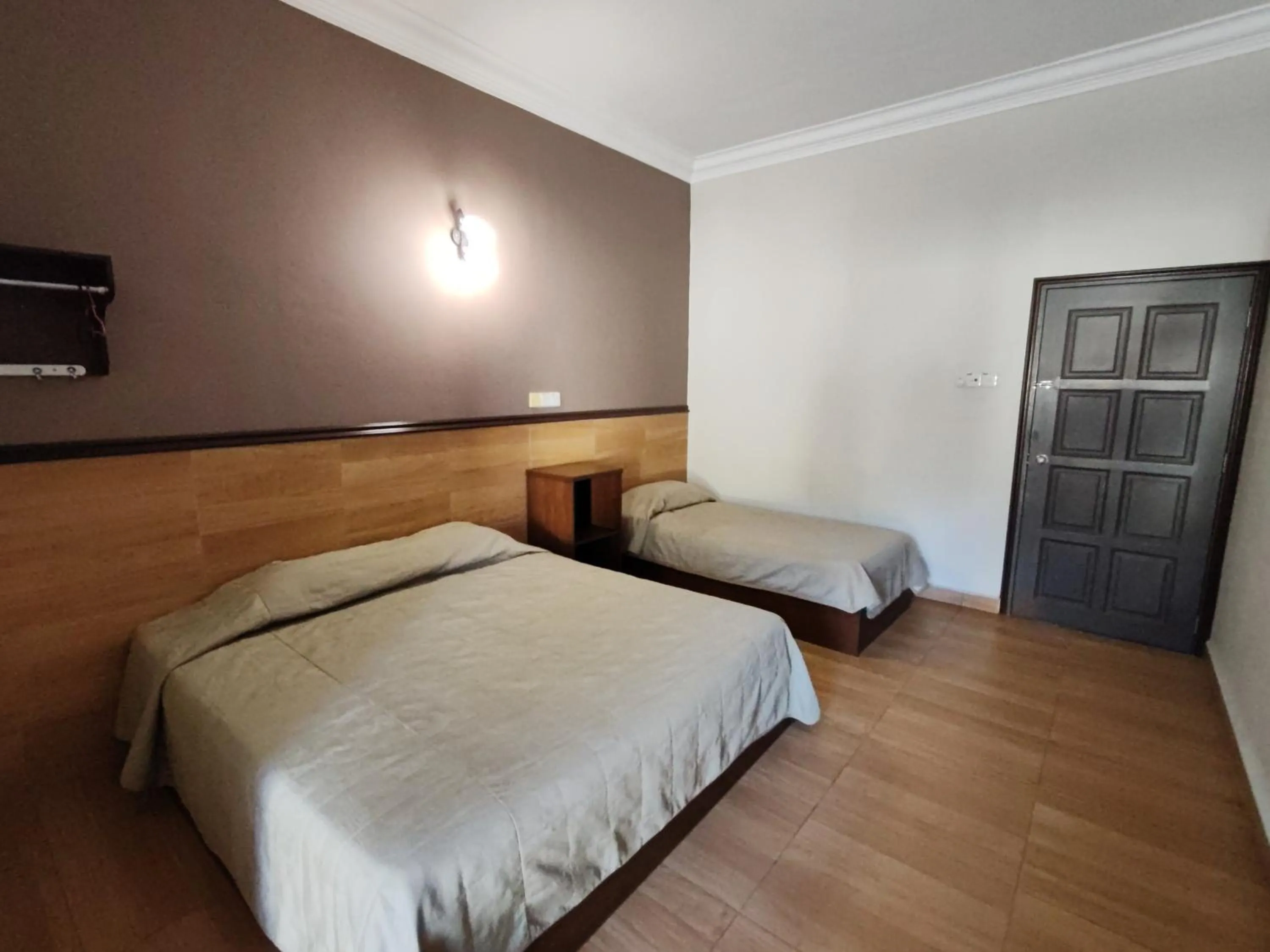 Bed in Lumut Villa Inn Homestay