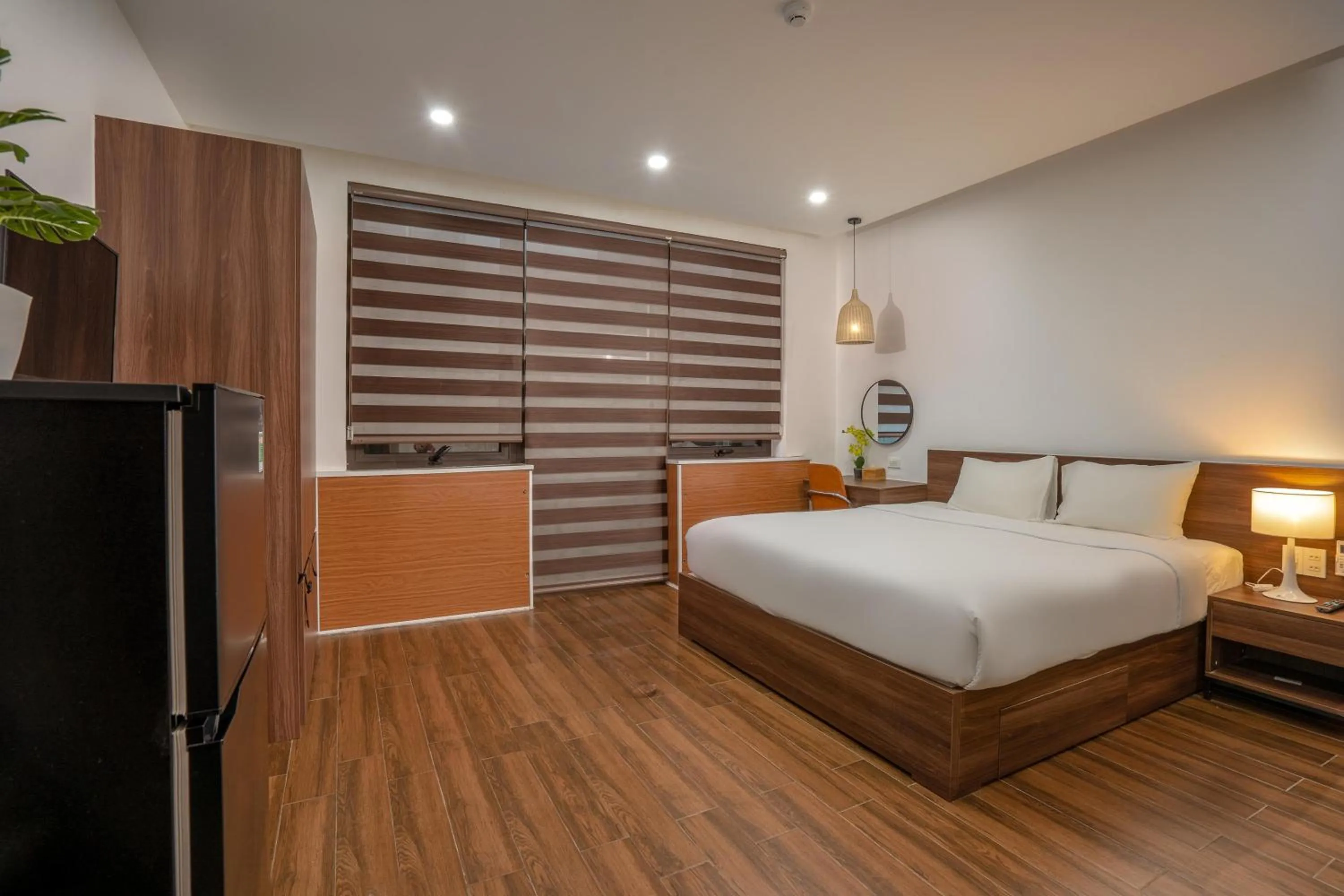 Photo of the whole room, Bed in Dragon View Riverside Hotel by Haviland