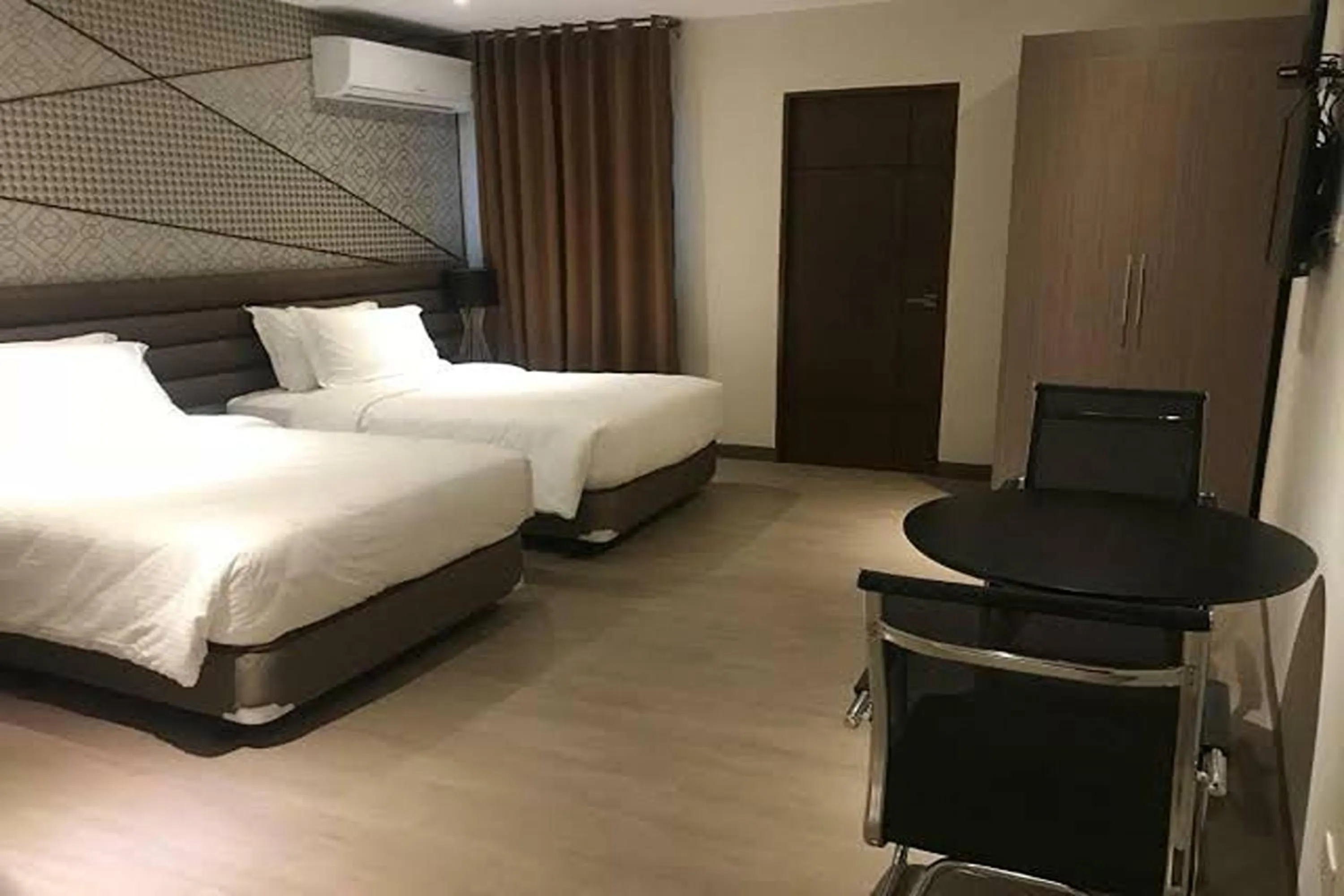 Bed in Maxx Hotel Ortigas