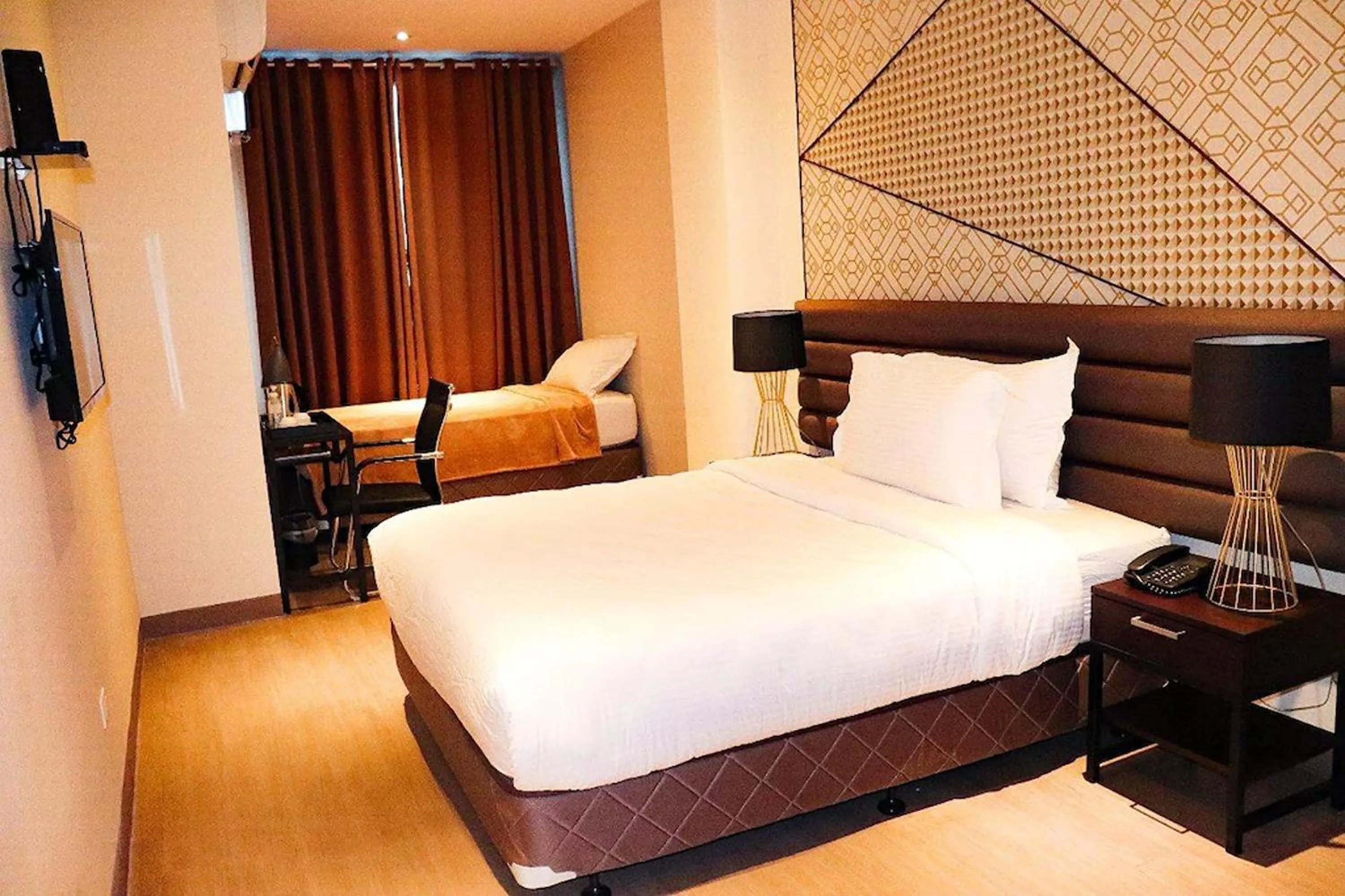 Bed in Maxx Hotel Ortigas