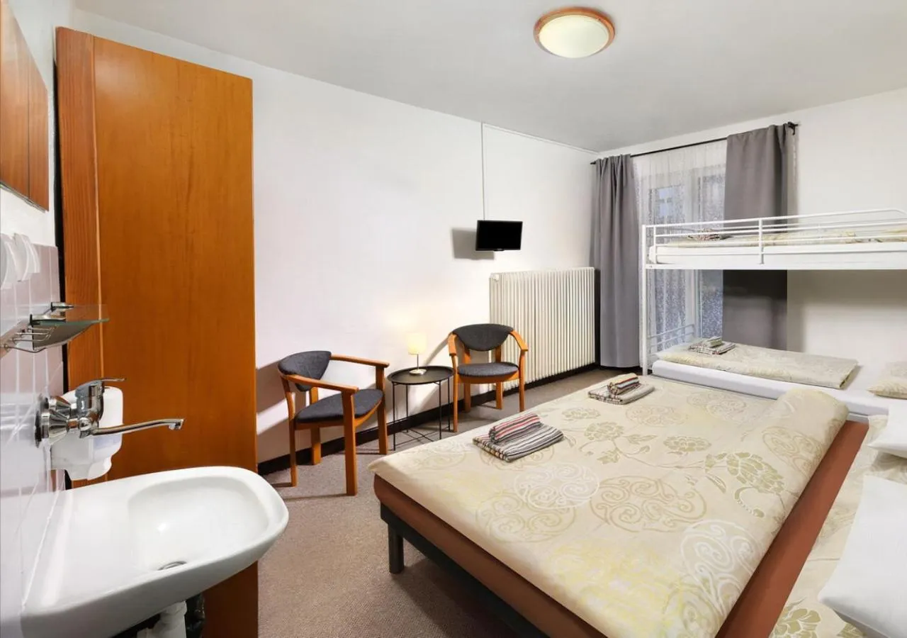 Living room, Bed in Hotel Liptov