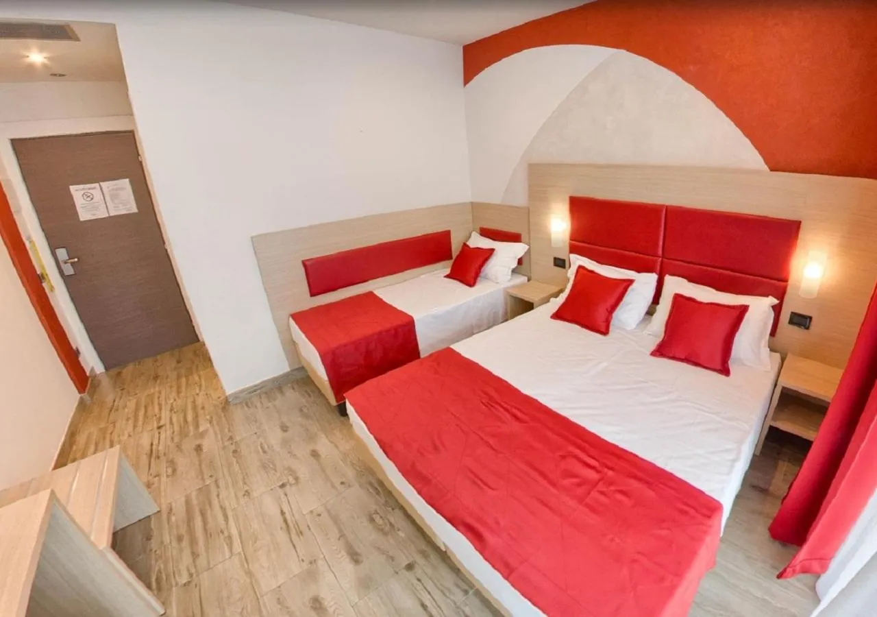 Bed in Hotel Luxor Florence