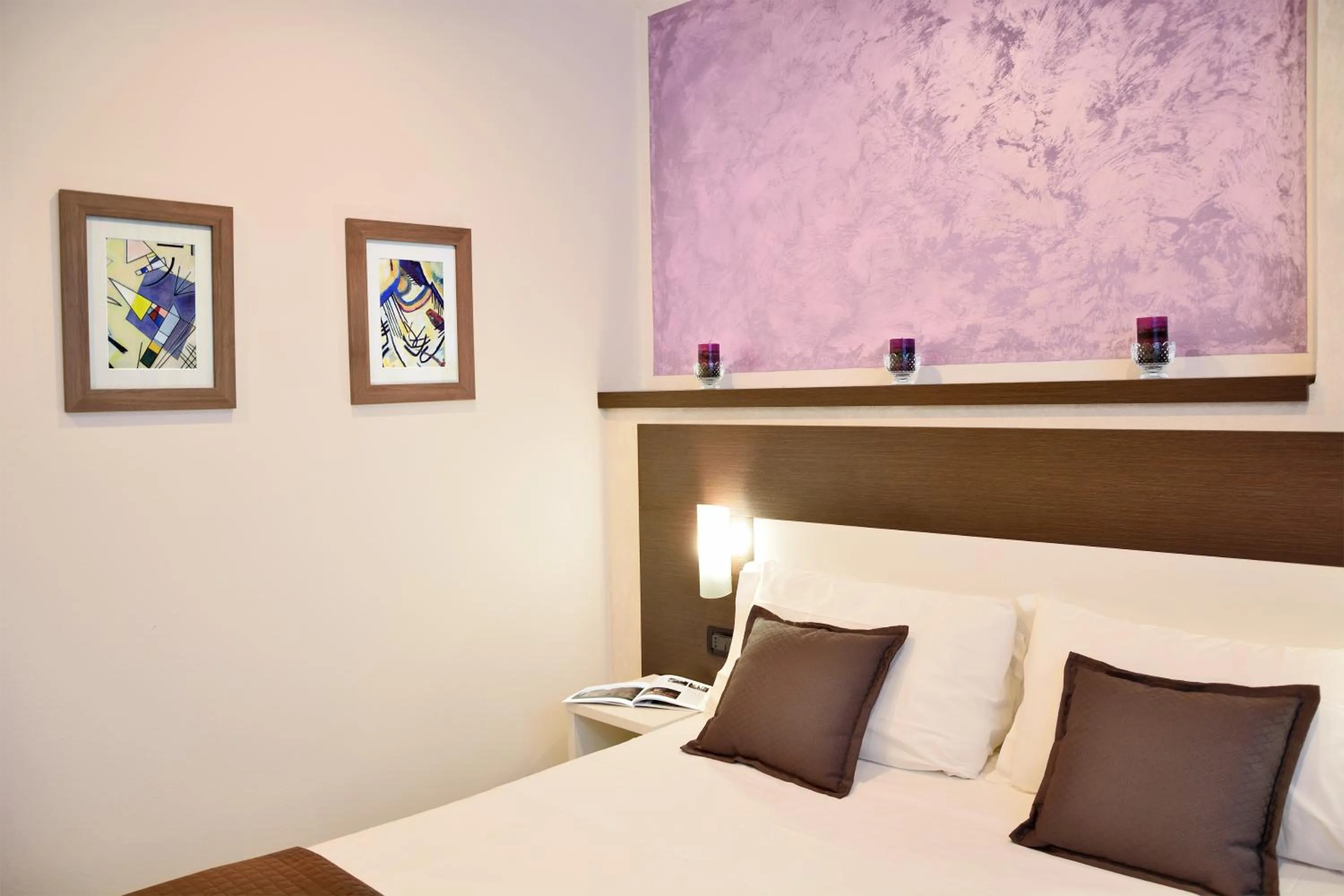 Bed in Hotel Luxor Florence