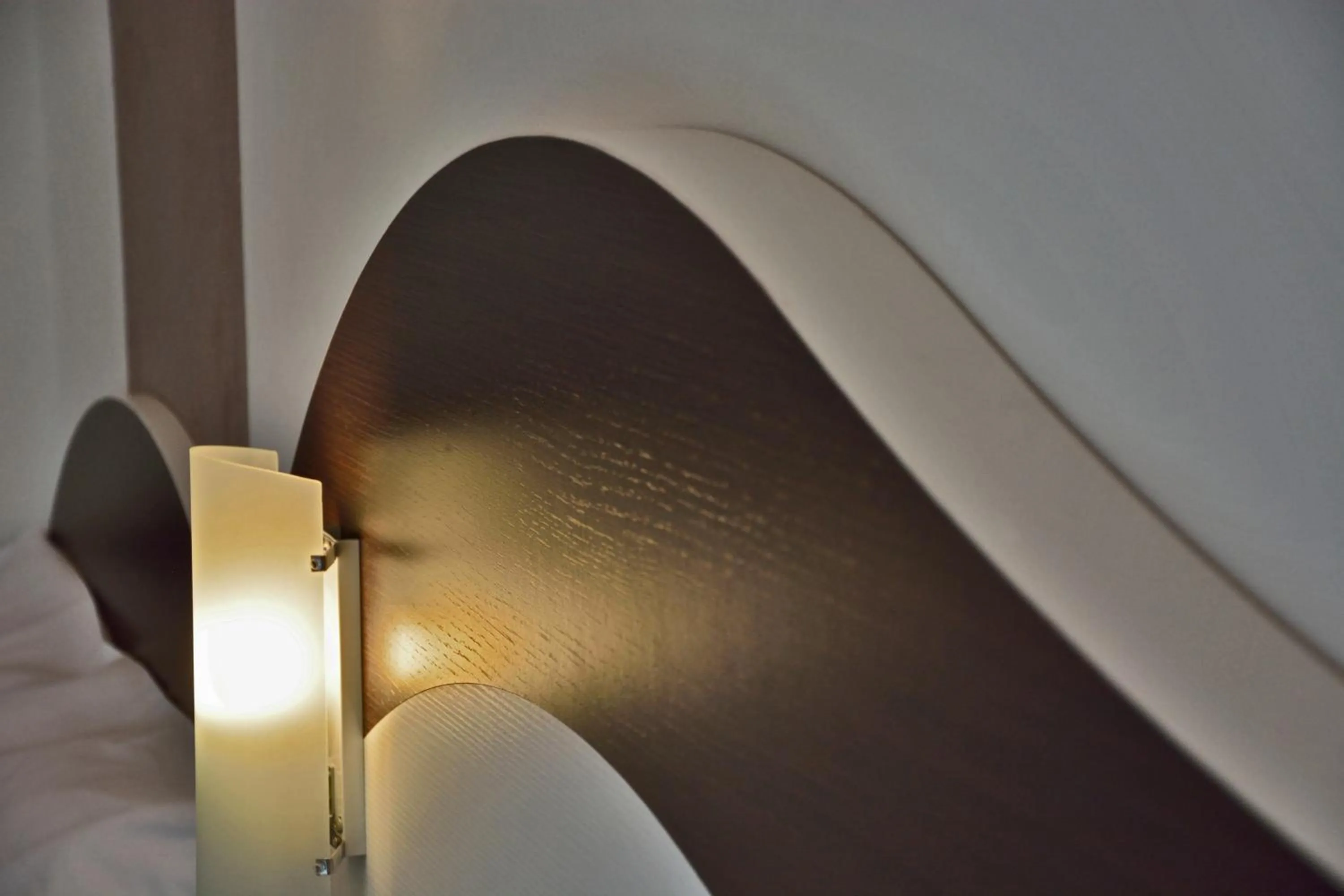 Decorative detail, Bed in Hotel Luxor Florence