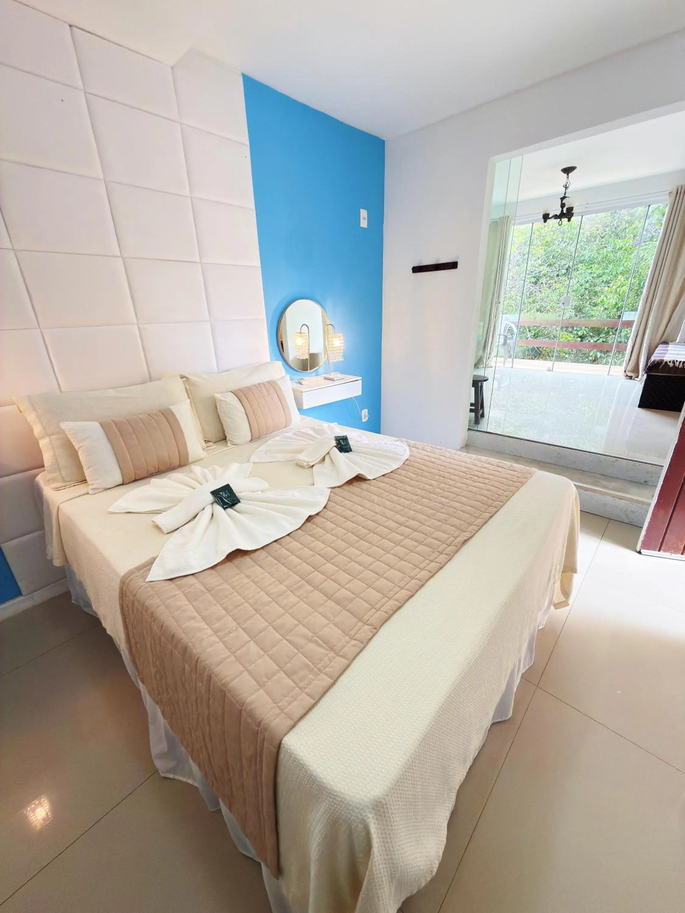 Bed in EstrelaMar Ferradura Restaurante & Spa