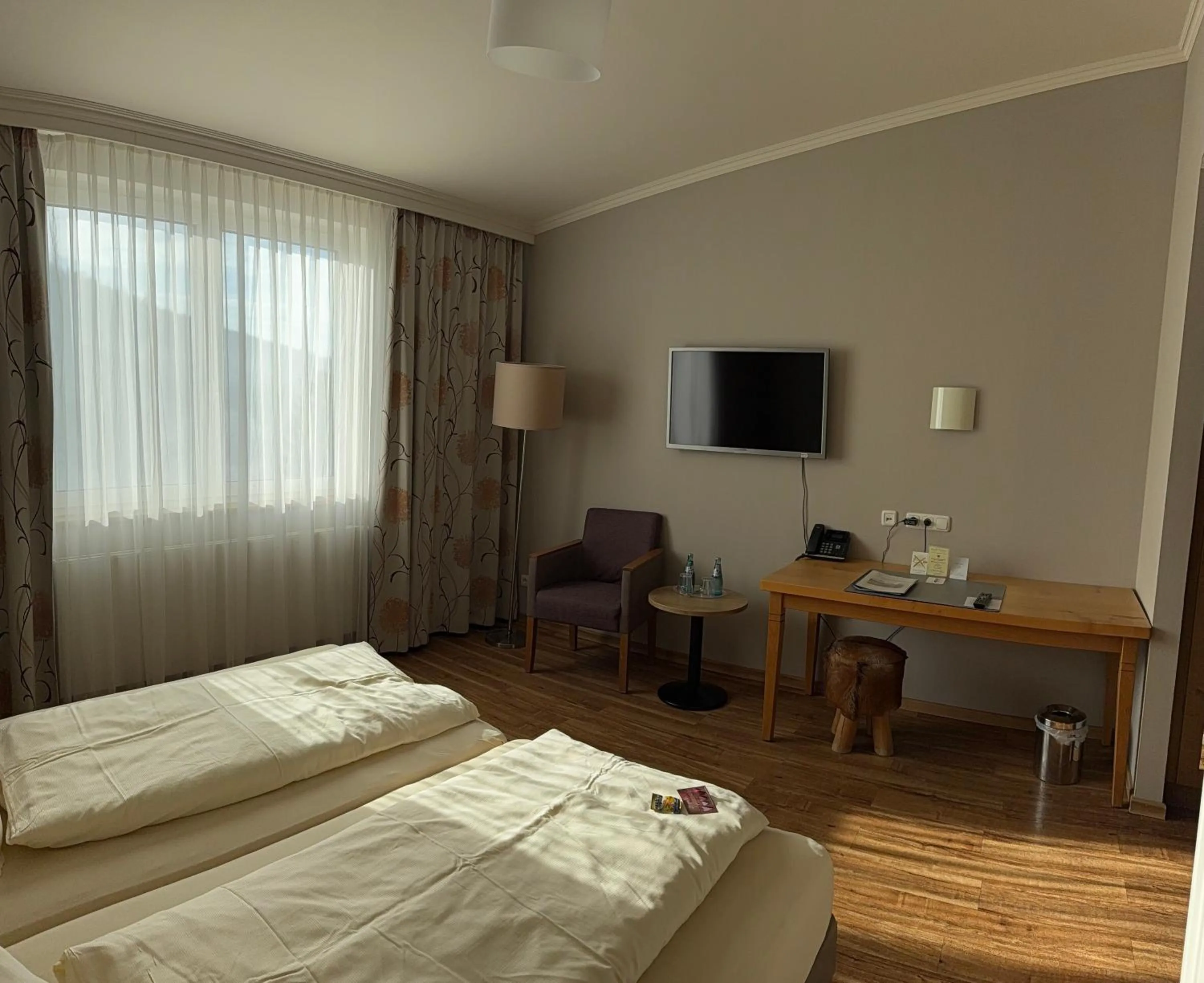 Photo of the whole room, Bed in Landhotel Kuralpe Kreuzhof