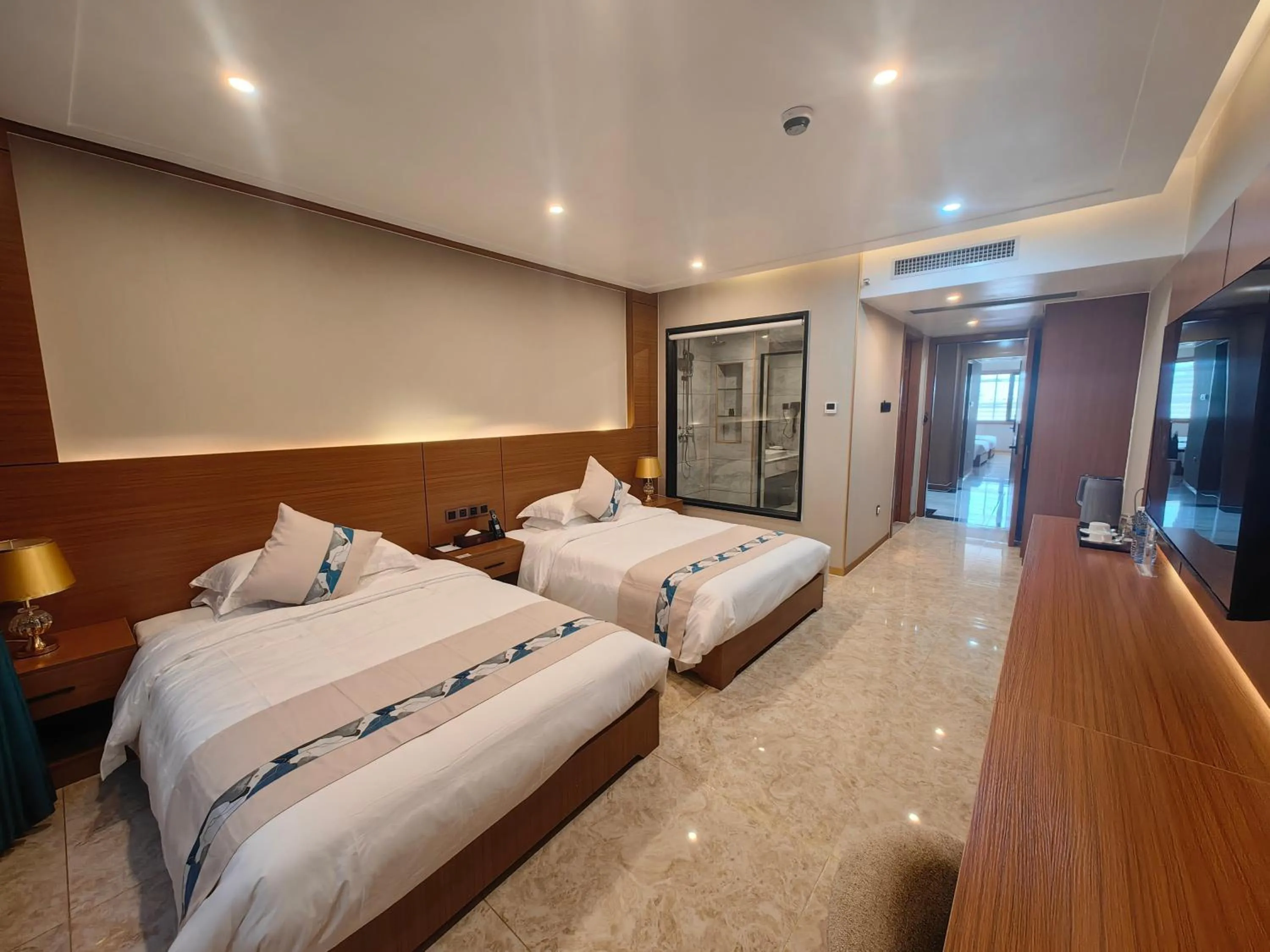 Bed in Royal International Hotel & Mall