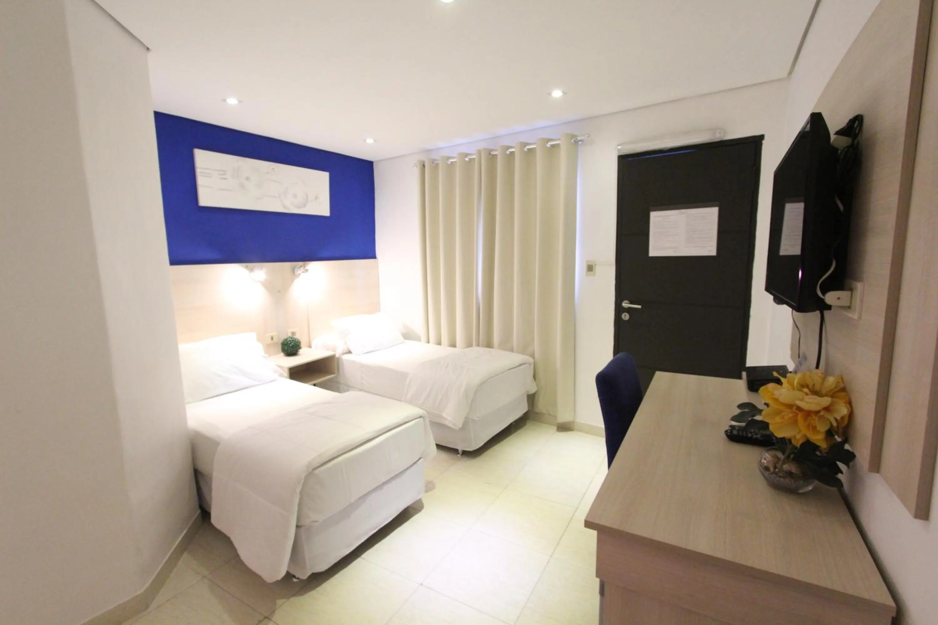 Bedroom, Bed in Danieri Asunción Hotel