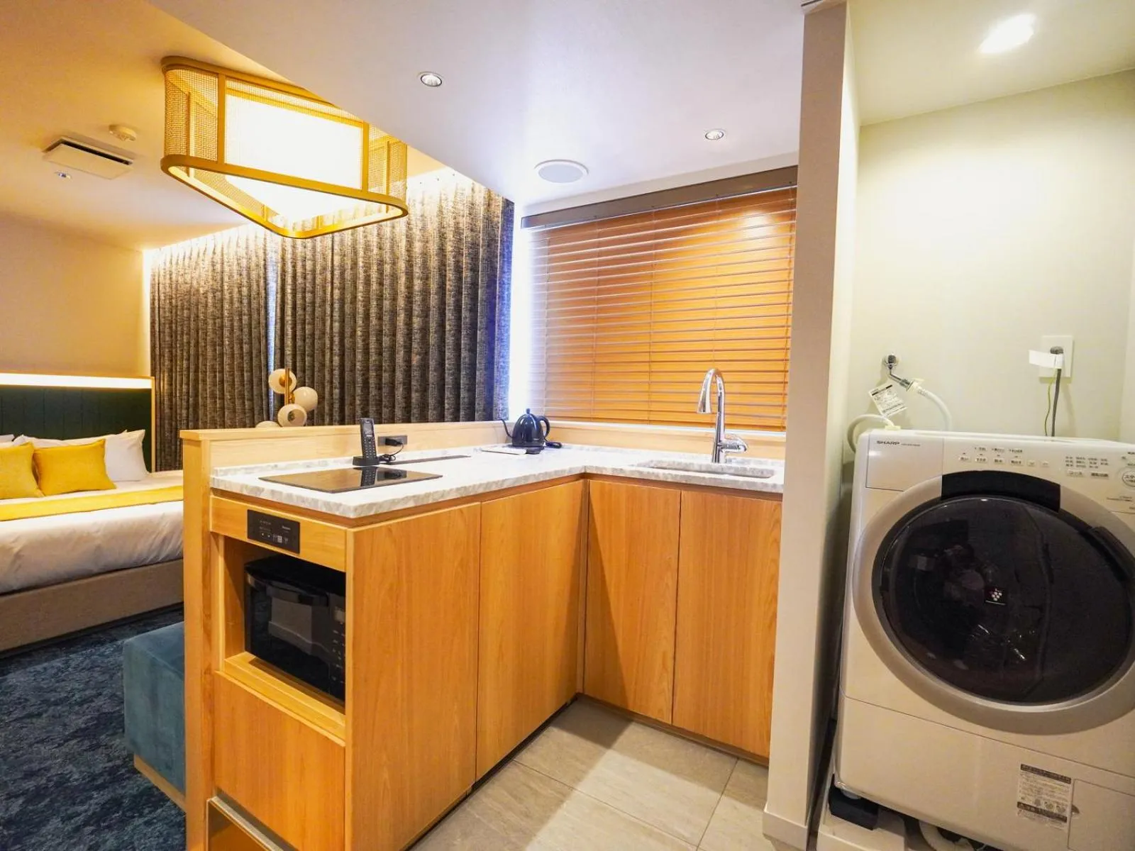 Kitchen or kitchenette, Bed in The GALA Hotel Umeda